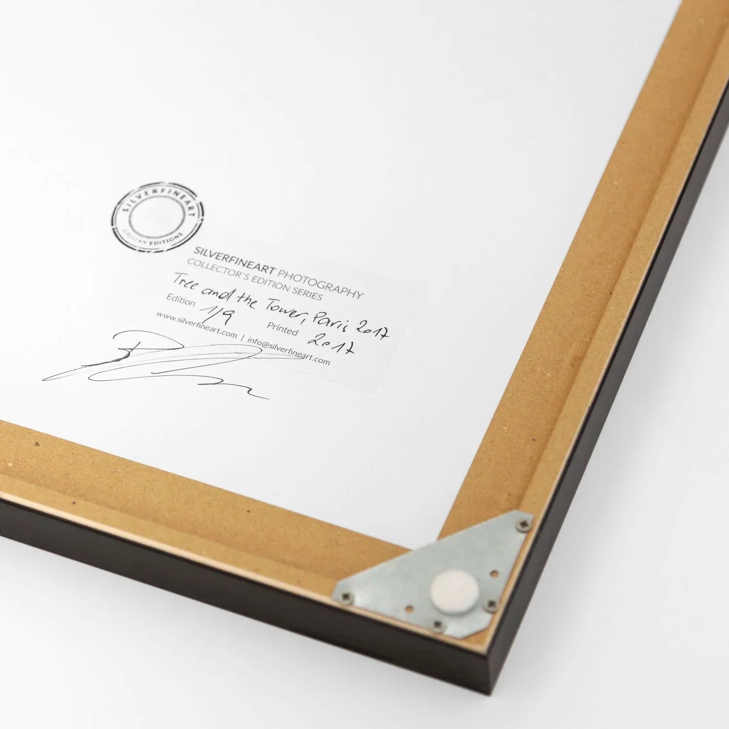 Reverse of Gerald Berghammer's Tree and the Tower artwork, showing the edition label, gallery stamp and artist's signature.