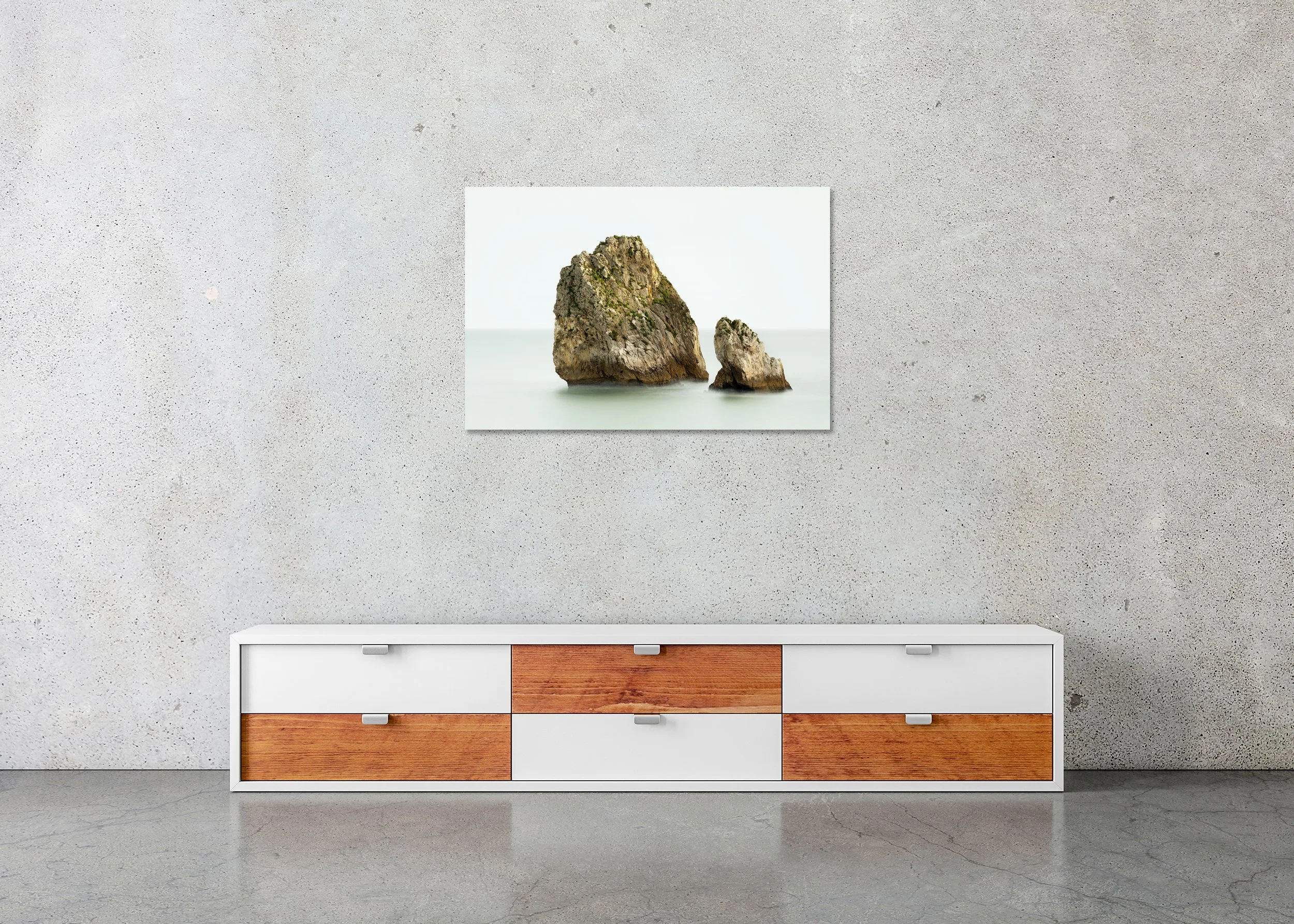 Two Rocks in the Sea Study 1 displayed in a modern interior as a frameless colour artwork mounted on aluminium Dibond by Gerald Berghammer.
