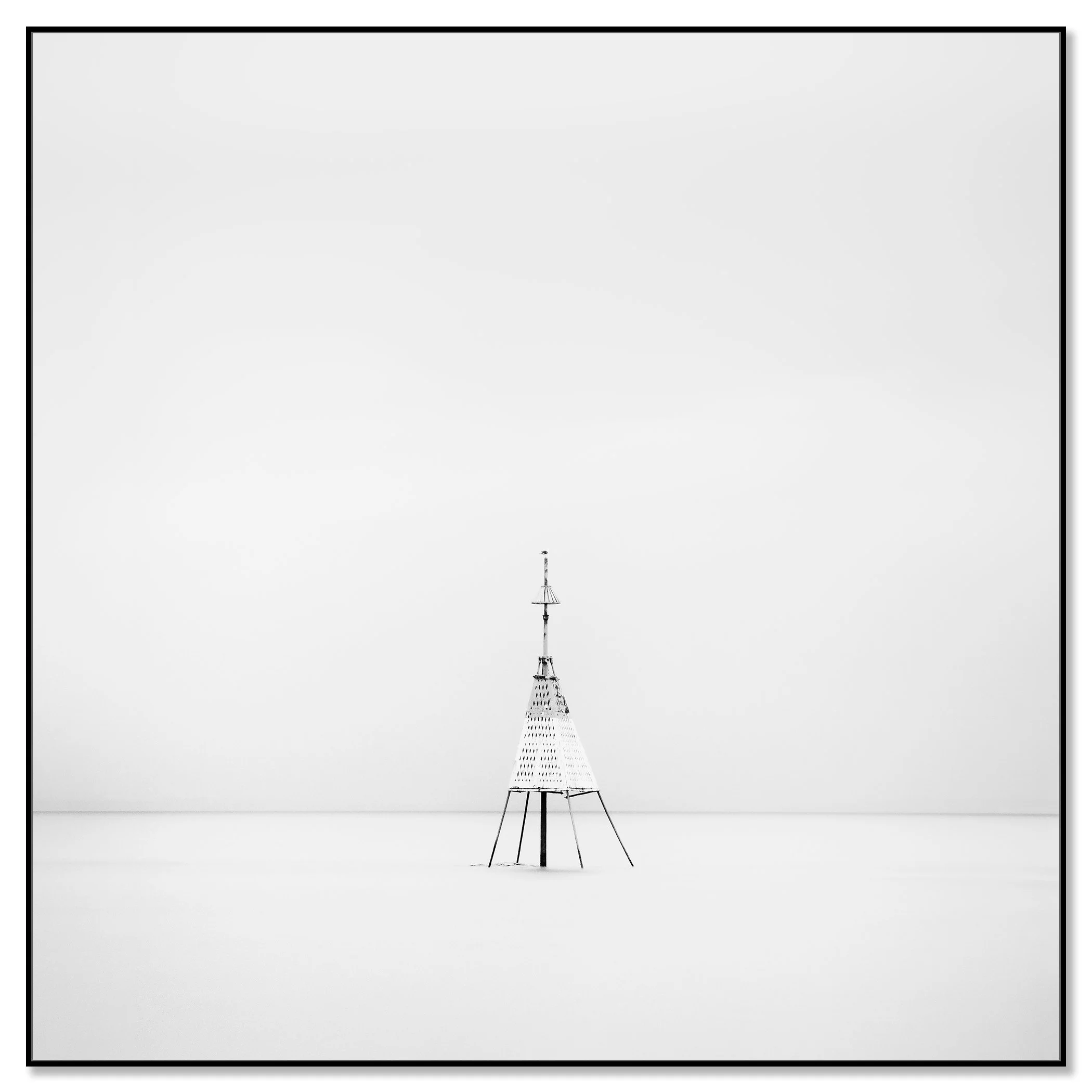 Gerald Berghammer - Black and white long exposure seascape photography. Solitary metal structure lighthouse with a conical top, standing in the Ocean. Chromaluxe framed black