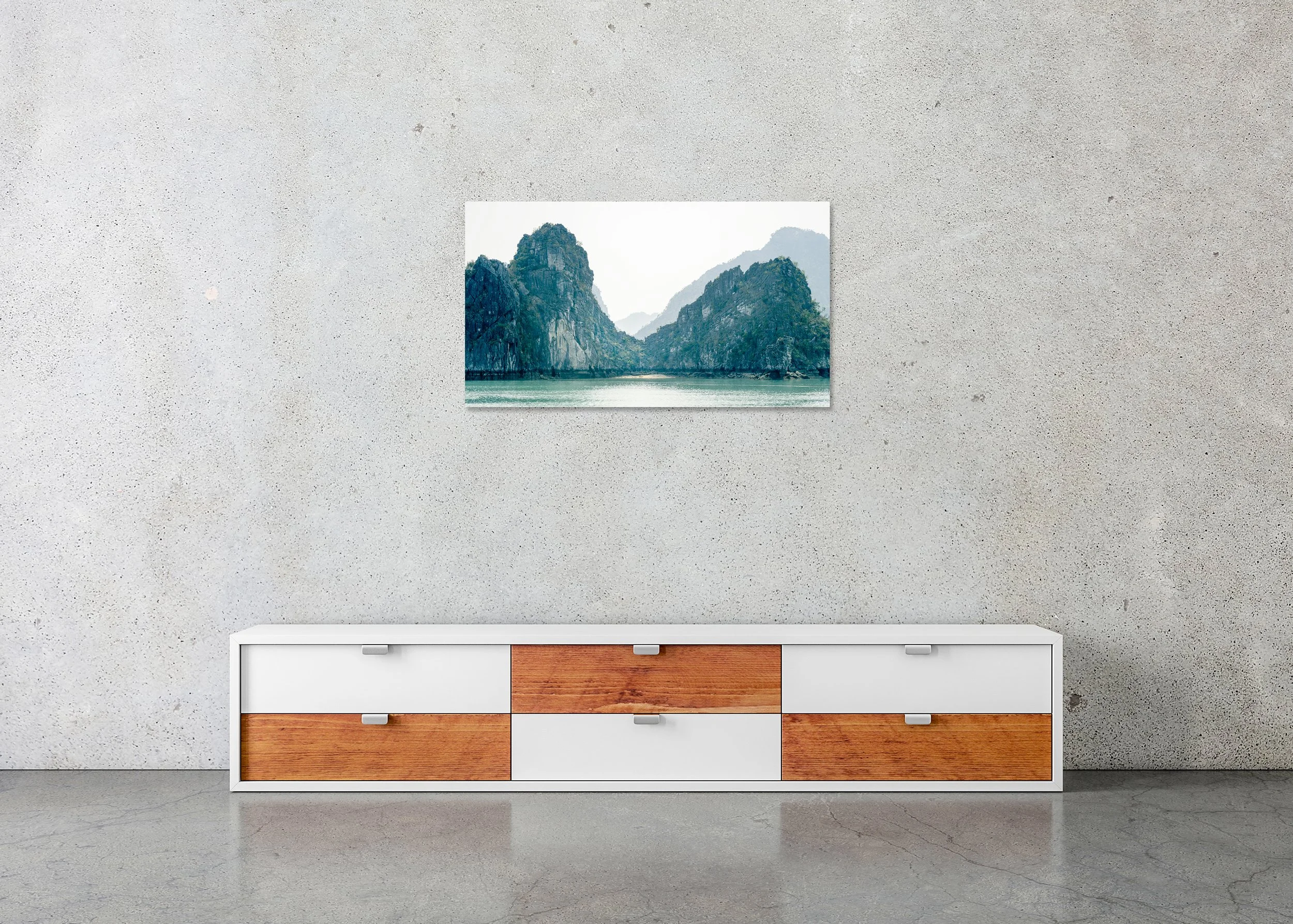 Hidden Beach and Green Hills – Ha Long Bay, frameless colour photograph on aluminium Dibond in a minimalist interior.