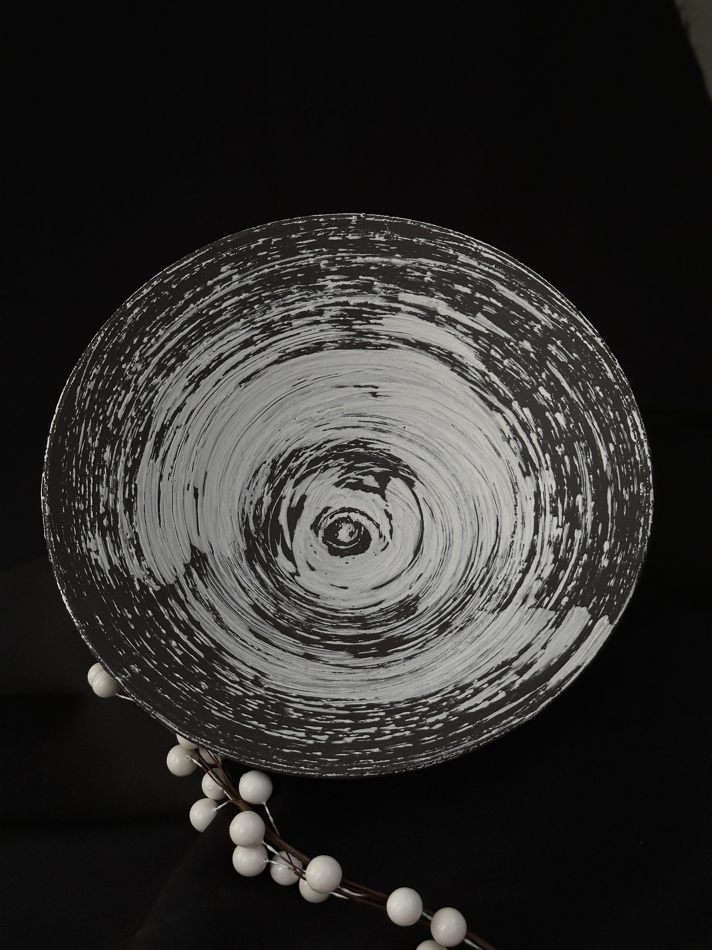 Black bowl with white slip decoration