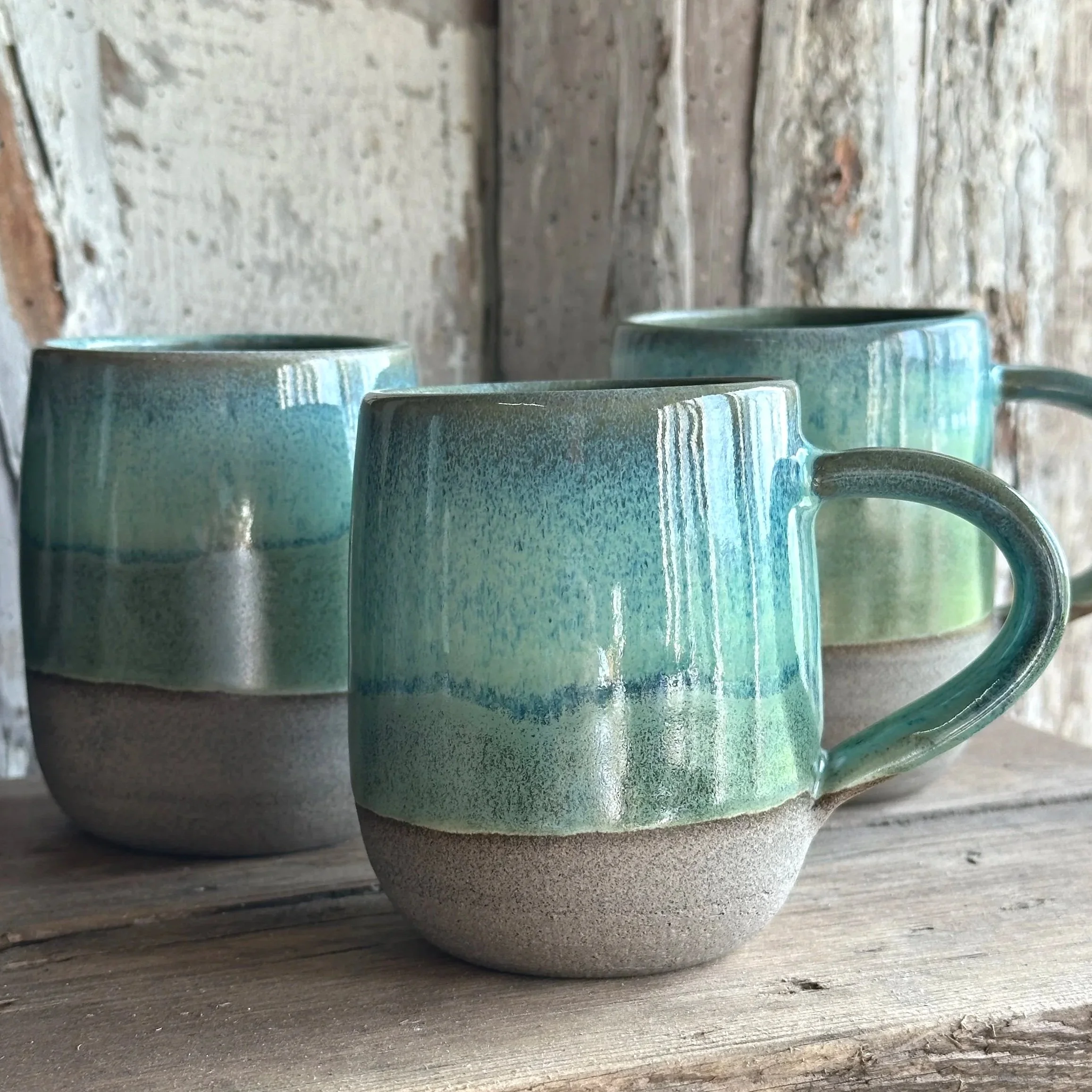 Layers of green over grey clay