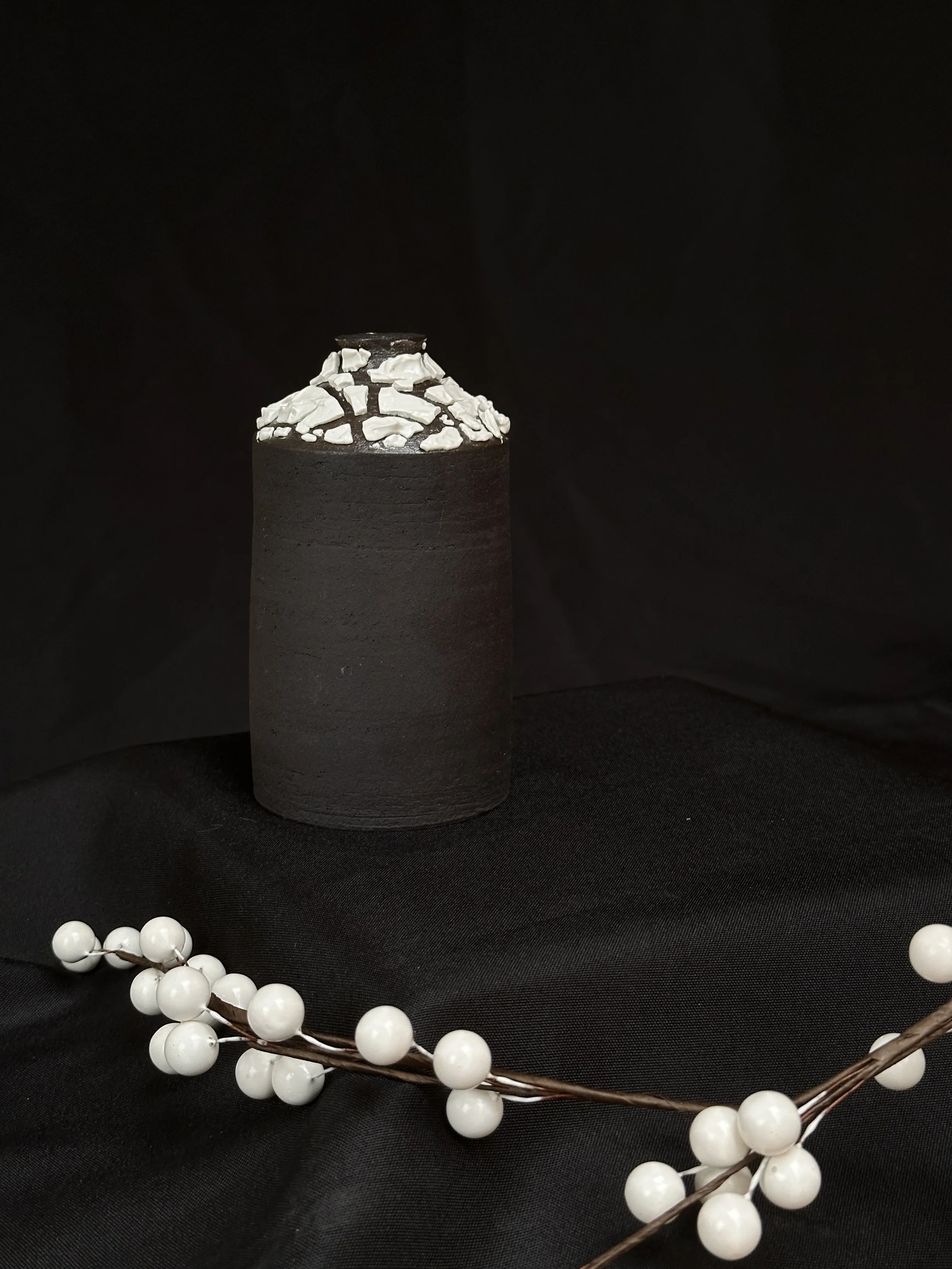 Black bottle vase with crawl glaze