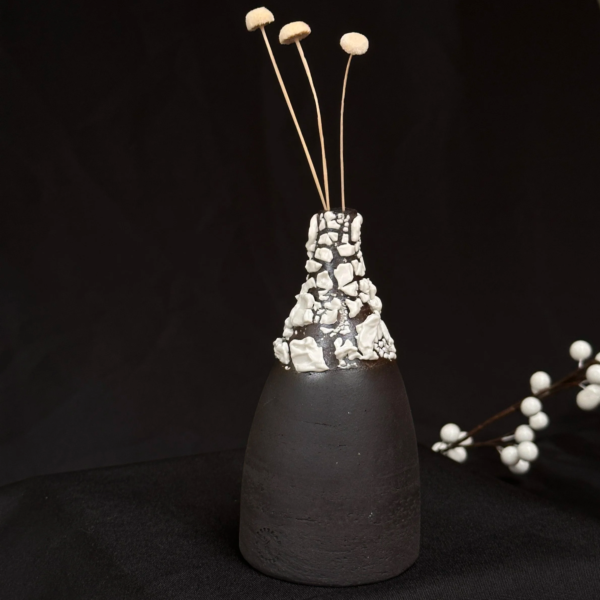 Black narrow neck bottle vase with crawl glaze