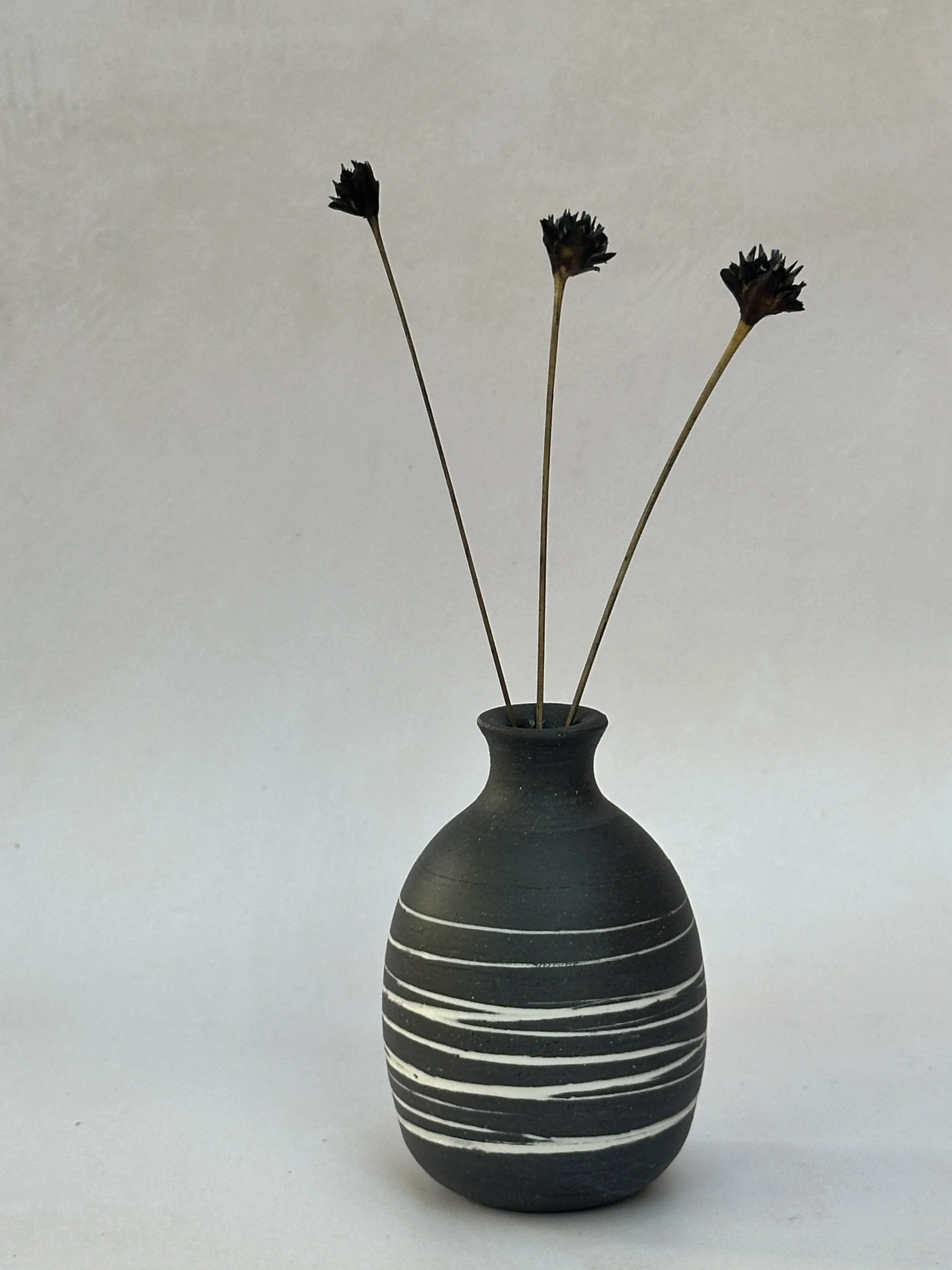 Round ceramic black porcelain vase