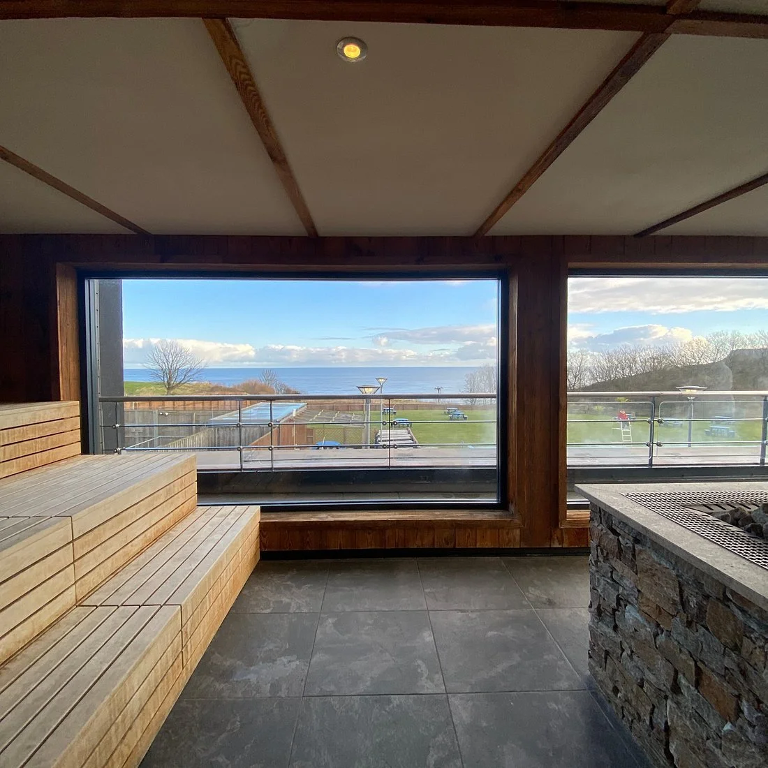 Panorama sauna overlooking Scarborough North Bay at Alpamare Wellness Spa.
