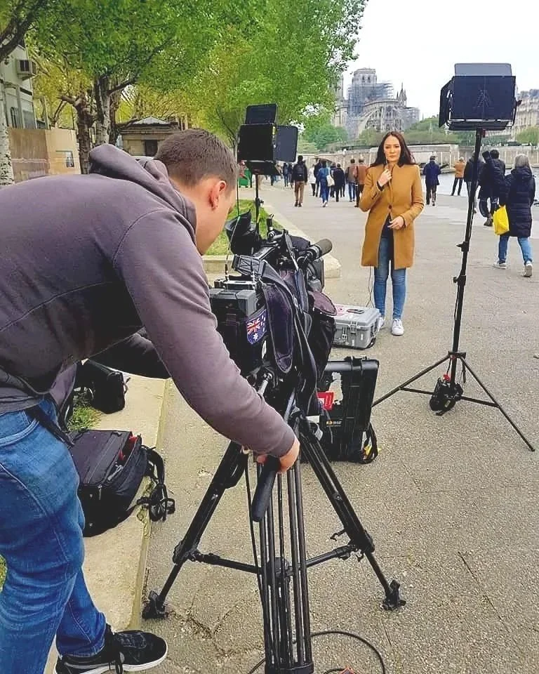 A reporter for ABC Australia covering the Notre-Dame Cathedral Fire in Central Paris in April 2015