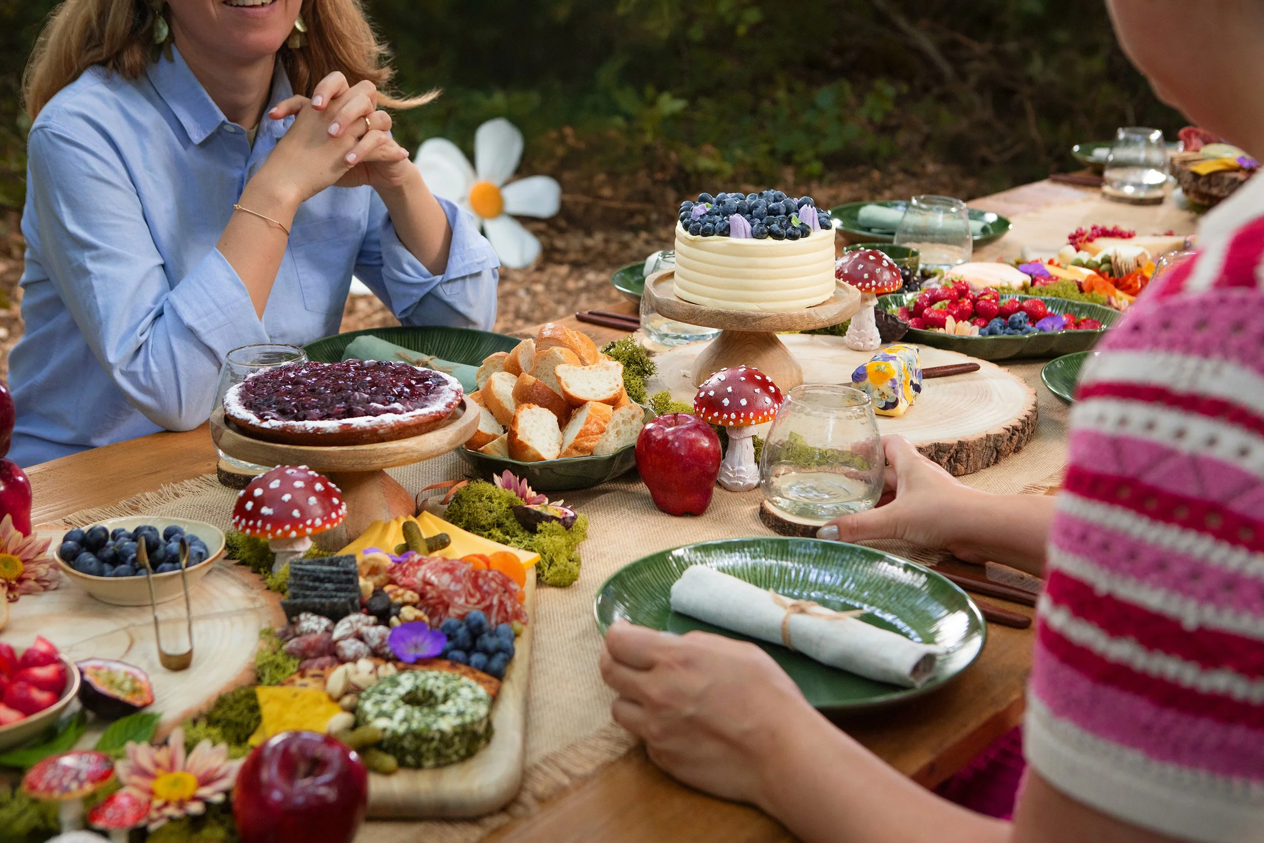 Smurf-themed picnic meal at the Airbnb Smurfs Experience in the Belgian forest, July 2025