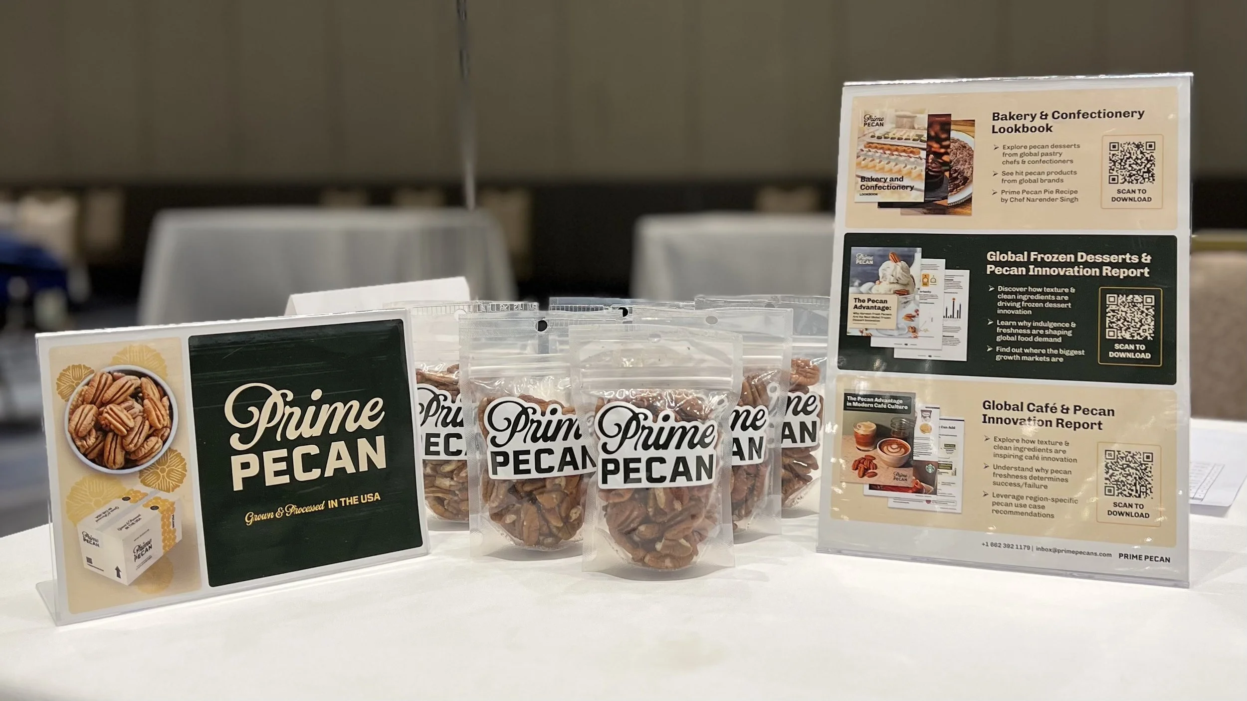Prime Pecan buyers meeting table setup with golden Prime Pecan samples.