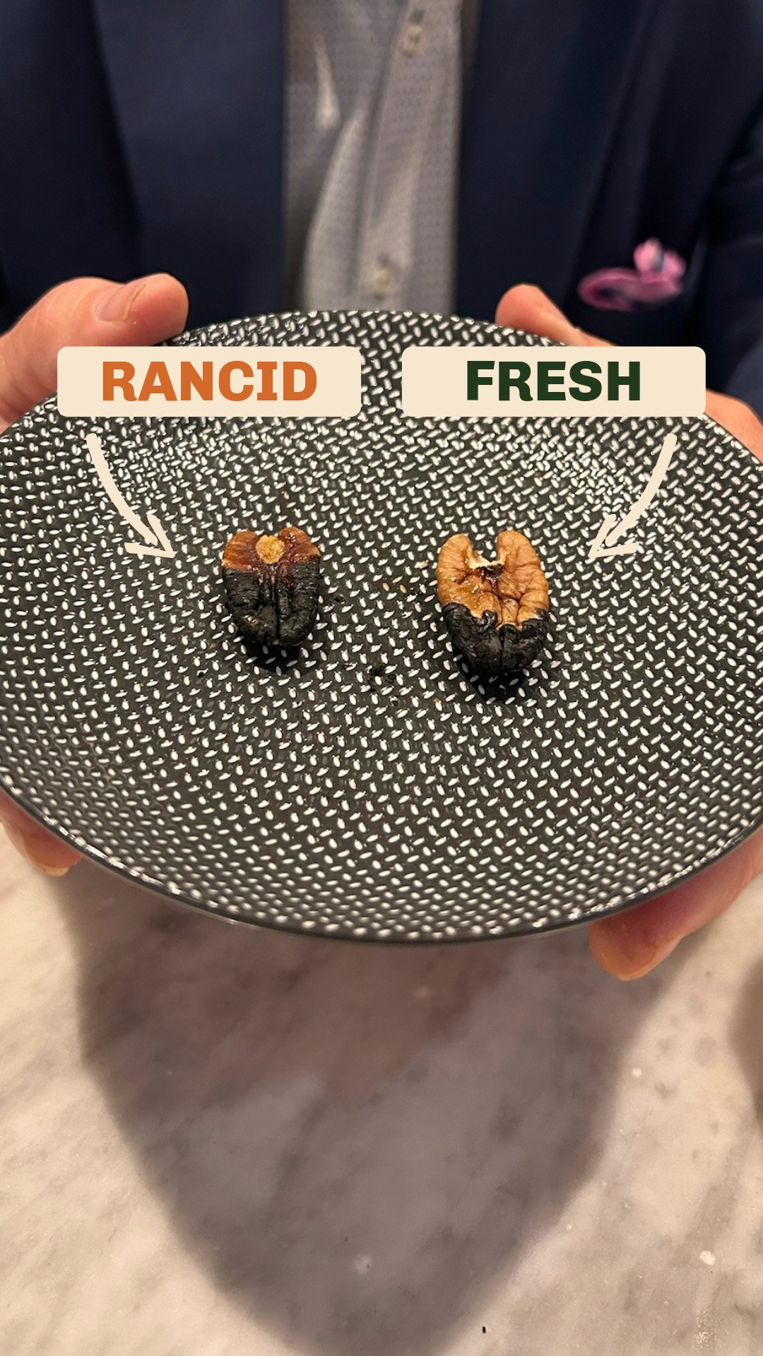 Side-by-side burn test showing rancid pecan vs fresh Prime Pecan flame