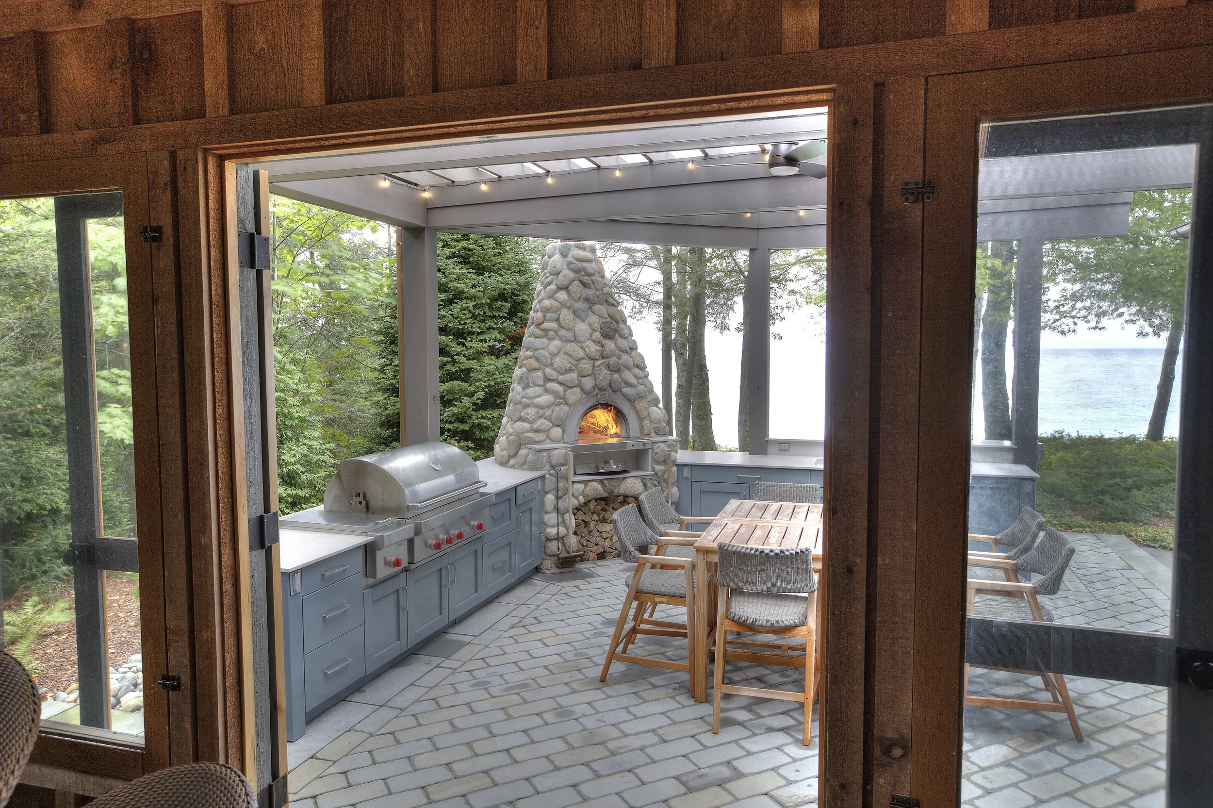 Rustic Outdoor Kitchen Outdoor Kitchen Remodel by Kitchen Choreography LLC project photo