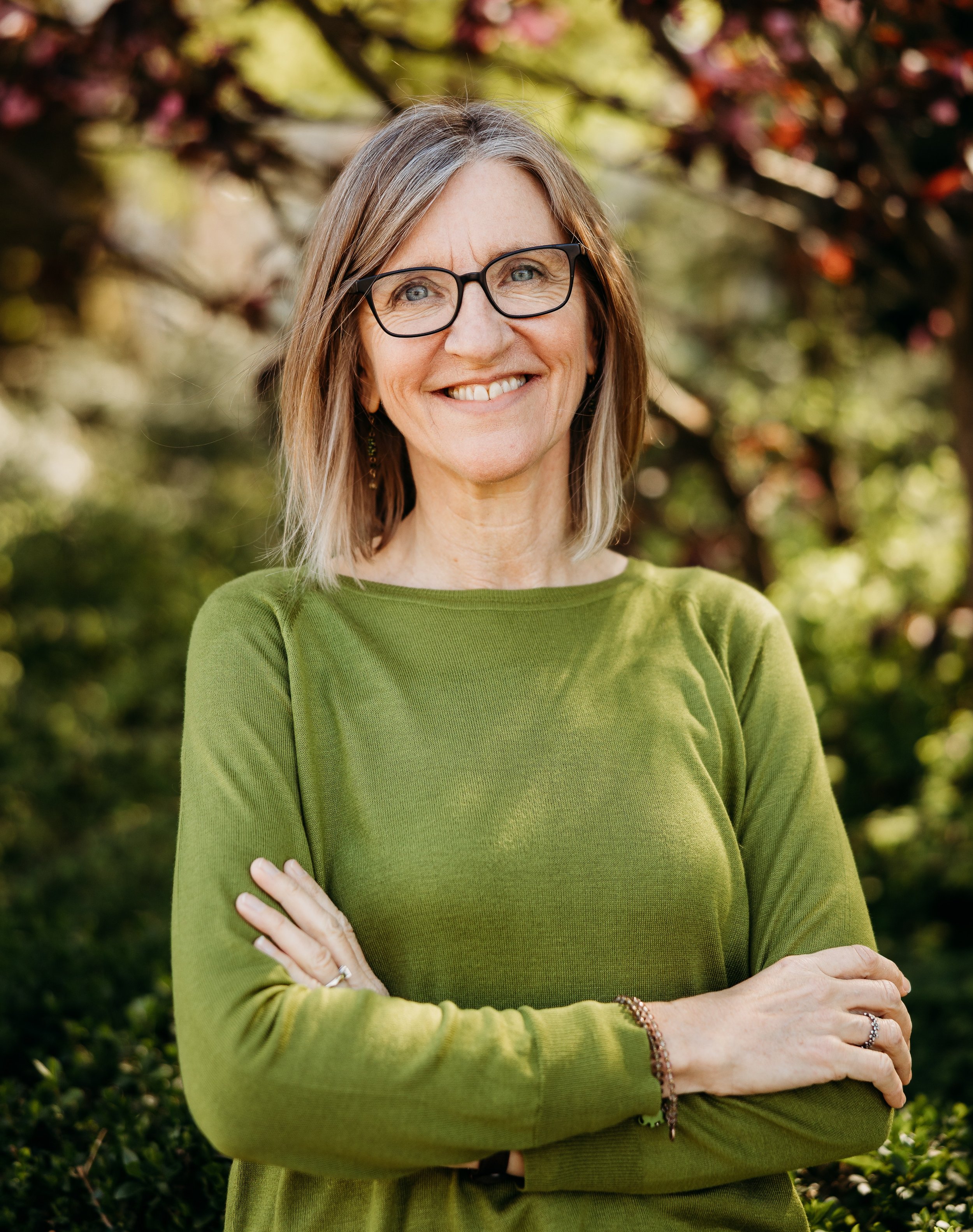Woman holding a sleeping baby in black and white image