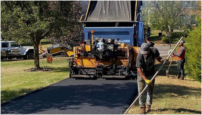 Harris Paving Truck and Worker.png