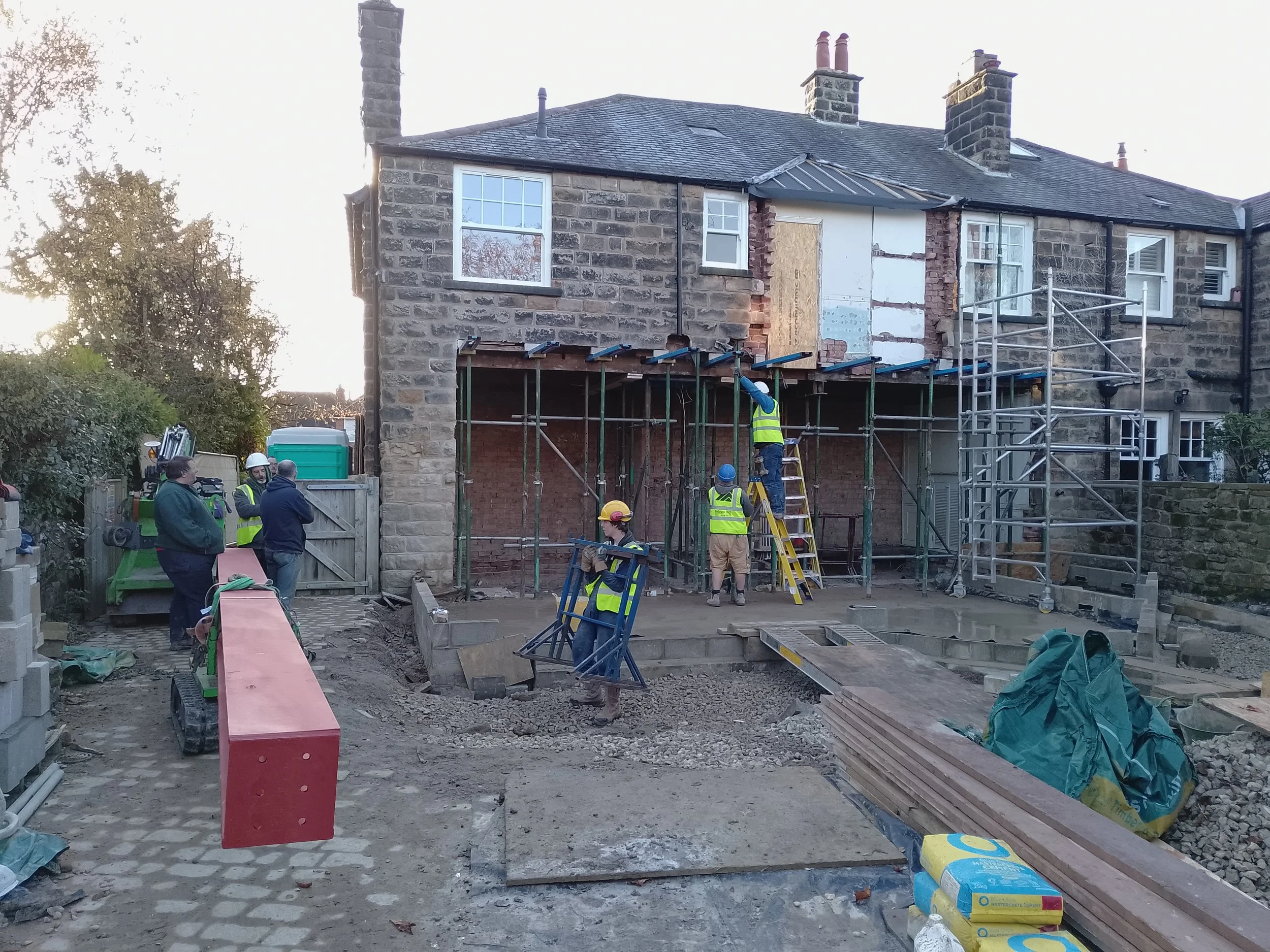 Belrow Hill construction workers installing structural steel for SIPs building project in Harrogate