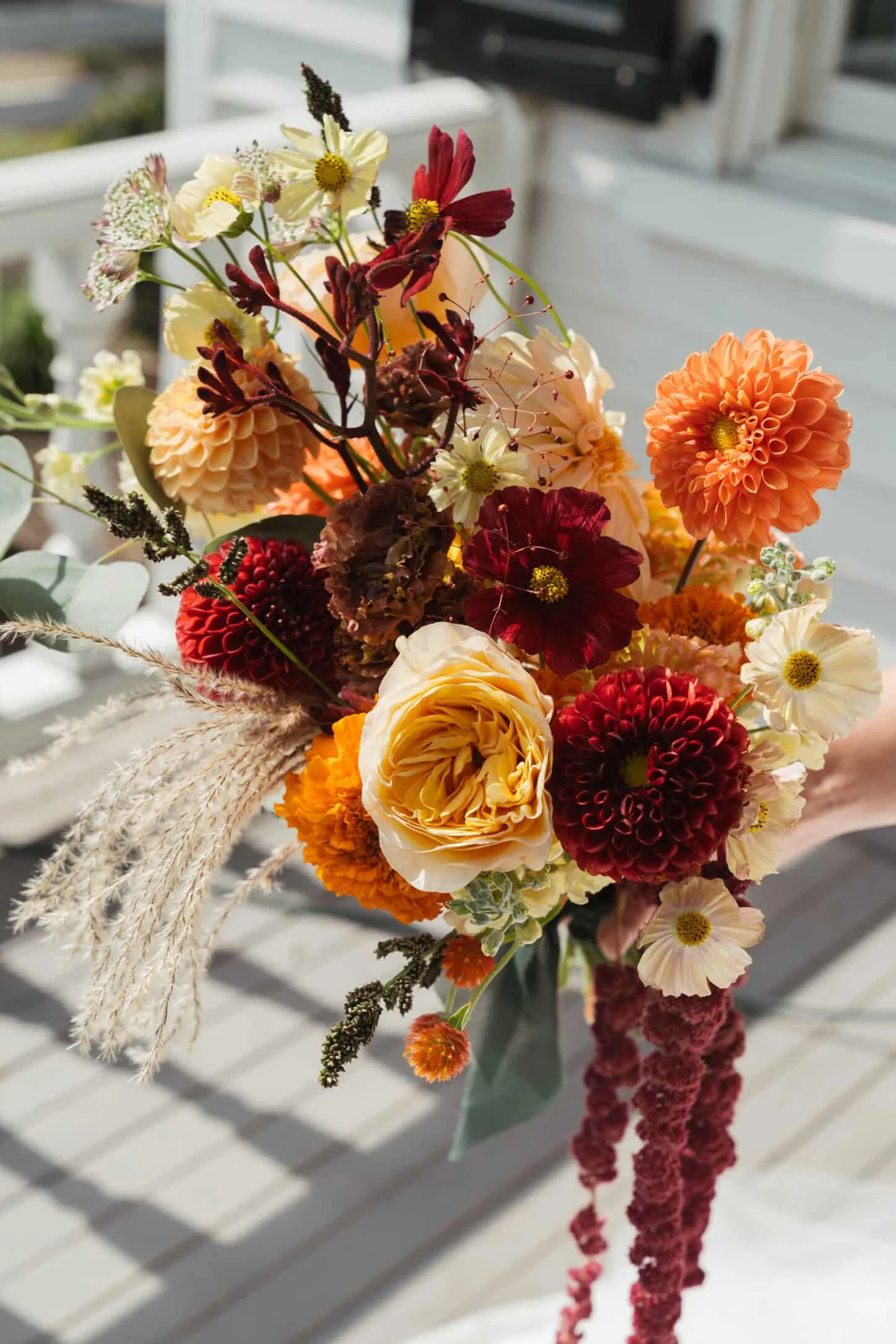Fall Bridal bouquet with orange, burgandy and yellow flowers