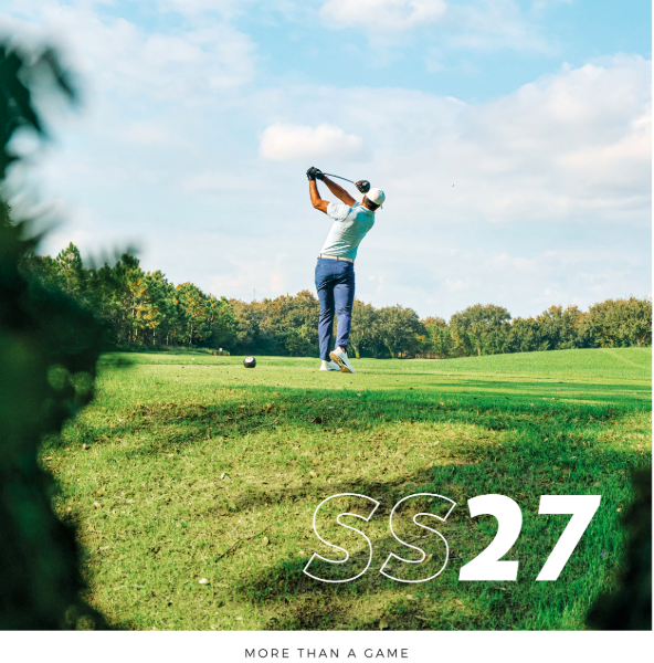 Golfer in coastal landscape swinging club, ECCO logo, text 'AW25' on image.