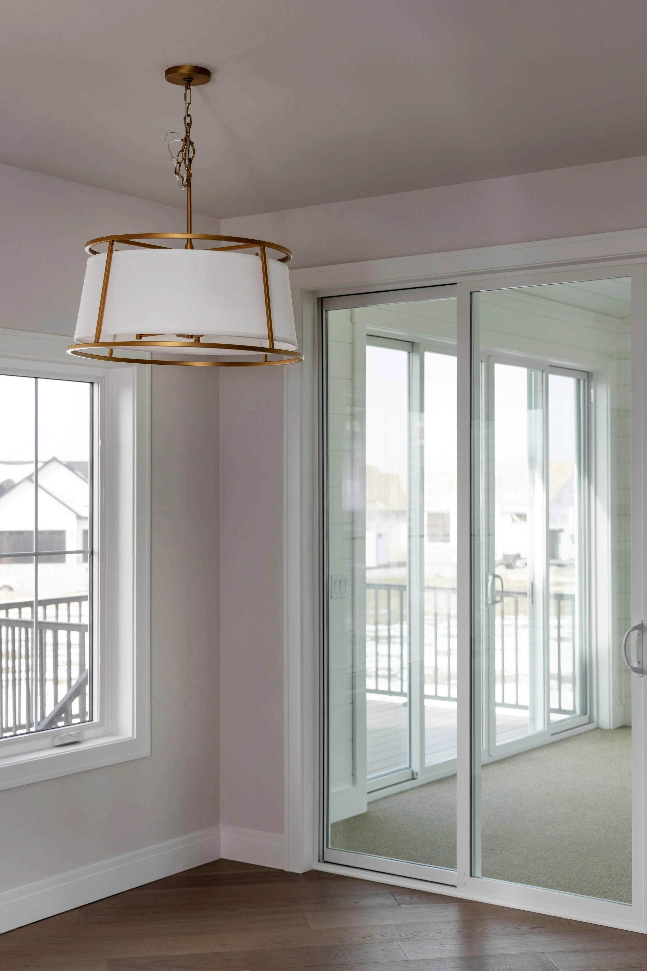 Glass sliding doors and a hanging light