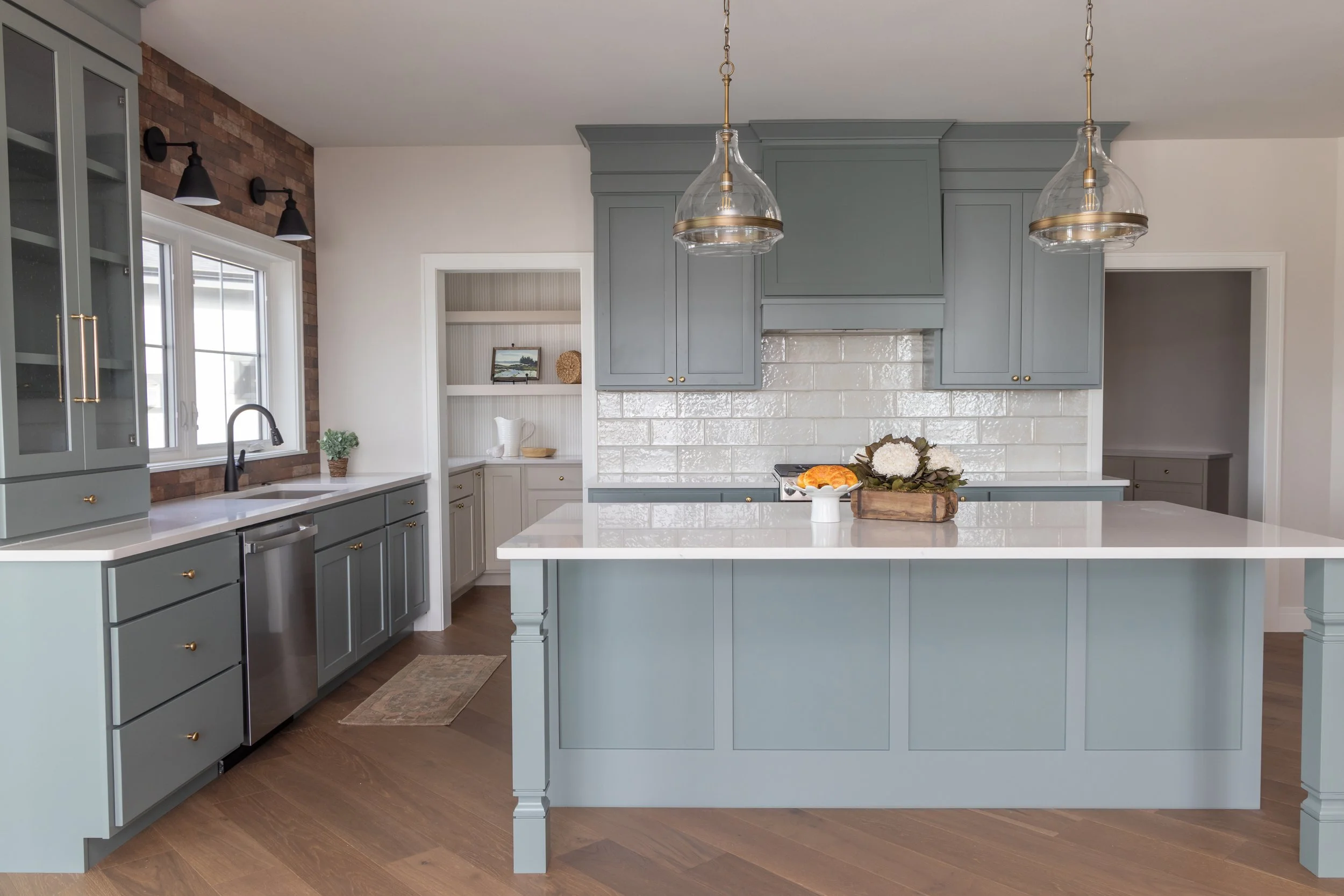Light blue and white open kitchen concept with large island