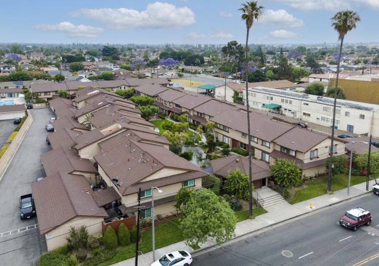 Top-down view of a single-family residential roof in Downey, CA