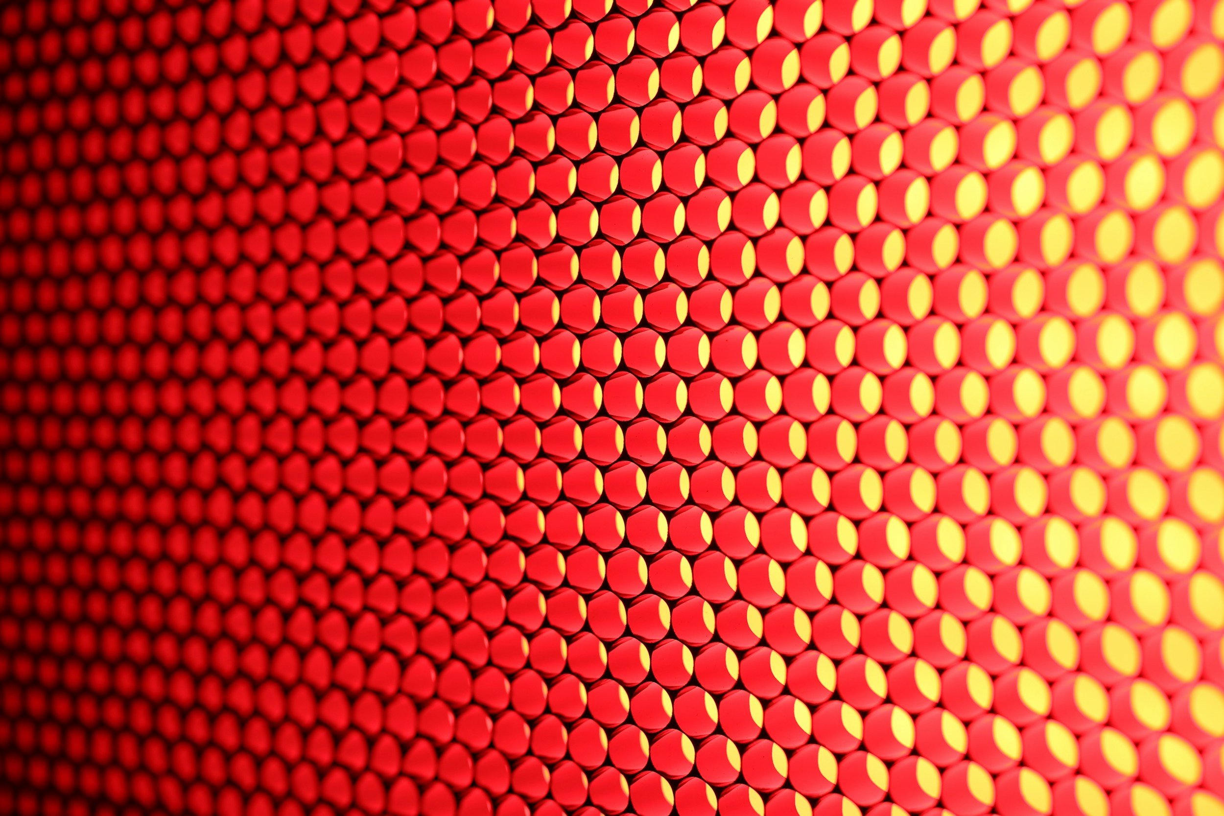 Close-up of illuminated red light therapy LEDs used for full-body and targeted photobiomodulation treatment.