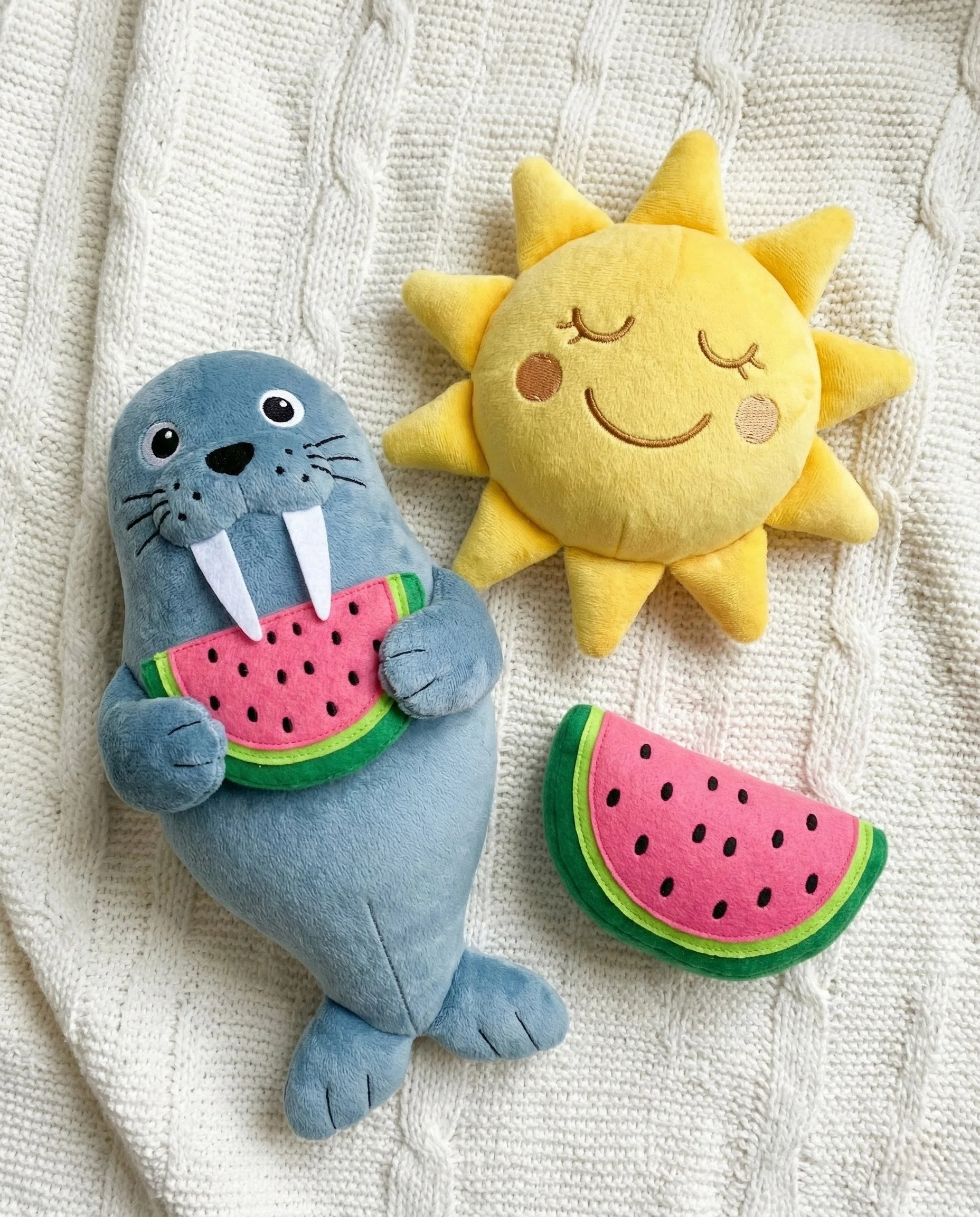 Three cute whimiscal stuffies of a watermelo,n a walrus and a happy sun designed for pattern collection art licensing by Hazel and henrietta