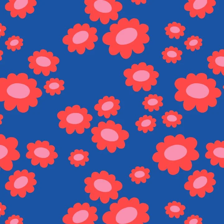 Pattern of pink and red flowers on a dark blue background.