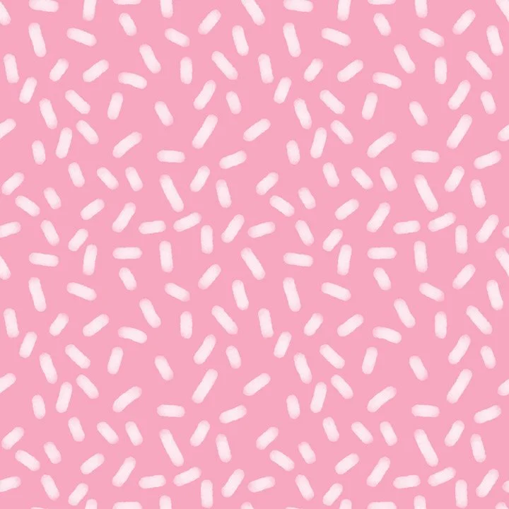 Playful abstract sprinkle pattern with hand-painted white dash marks on a soft pink background