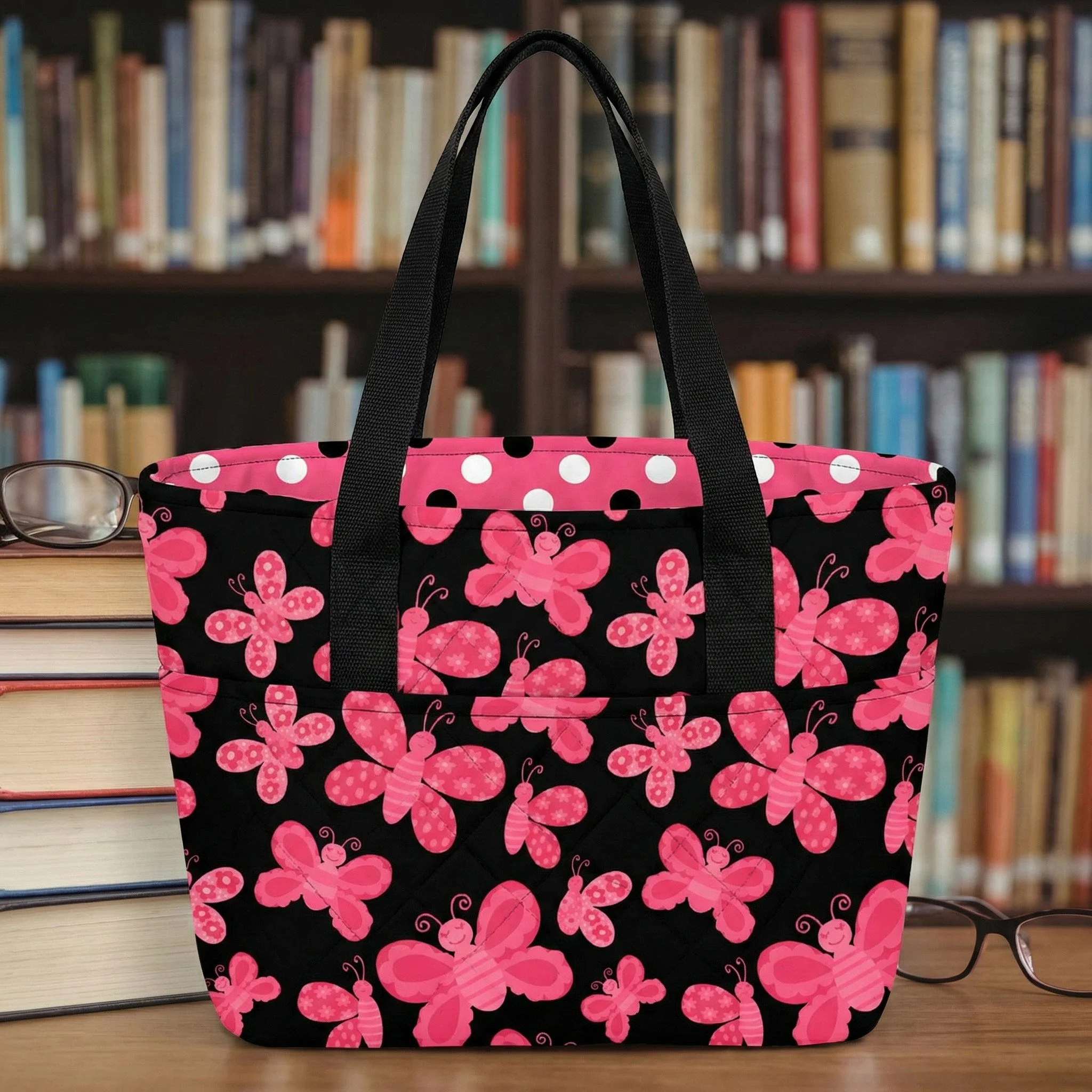 Quilted tote bag featuring whimsical butterfly artwork from the Love and Ladybugs fabric collection