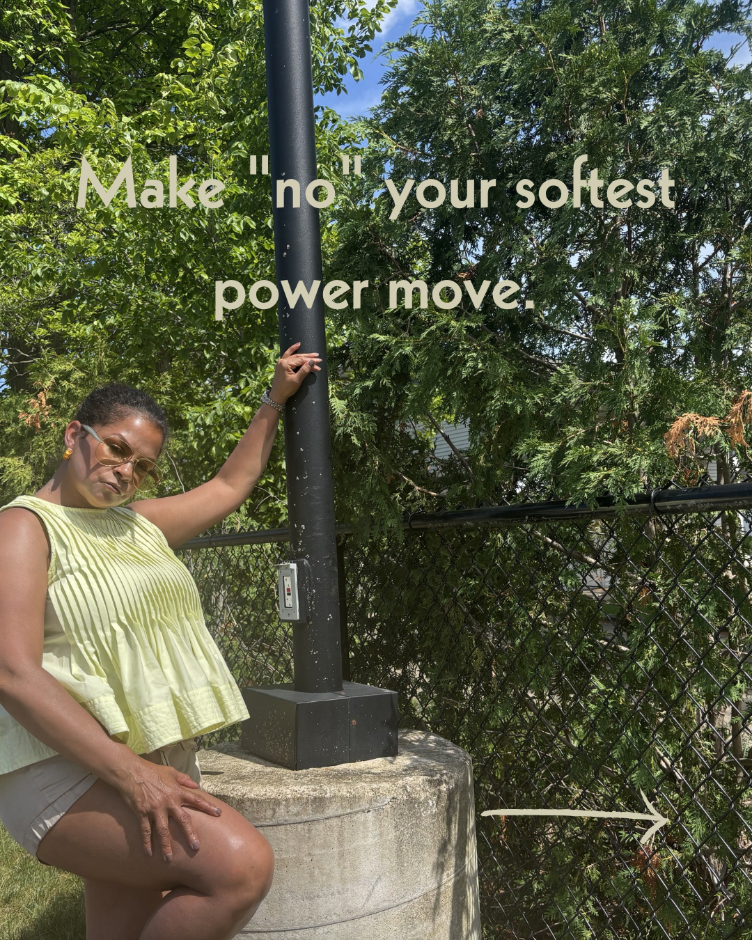 Keenya Willis leaning against a dark pole in a yellow top with text overlay reading Make your no your softest power move representing boundary setting as elegant self protection