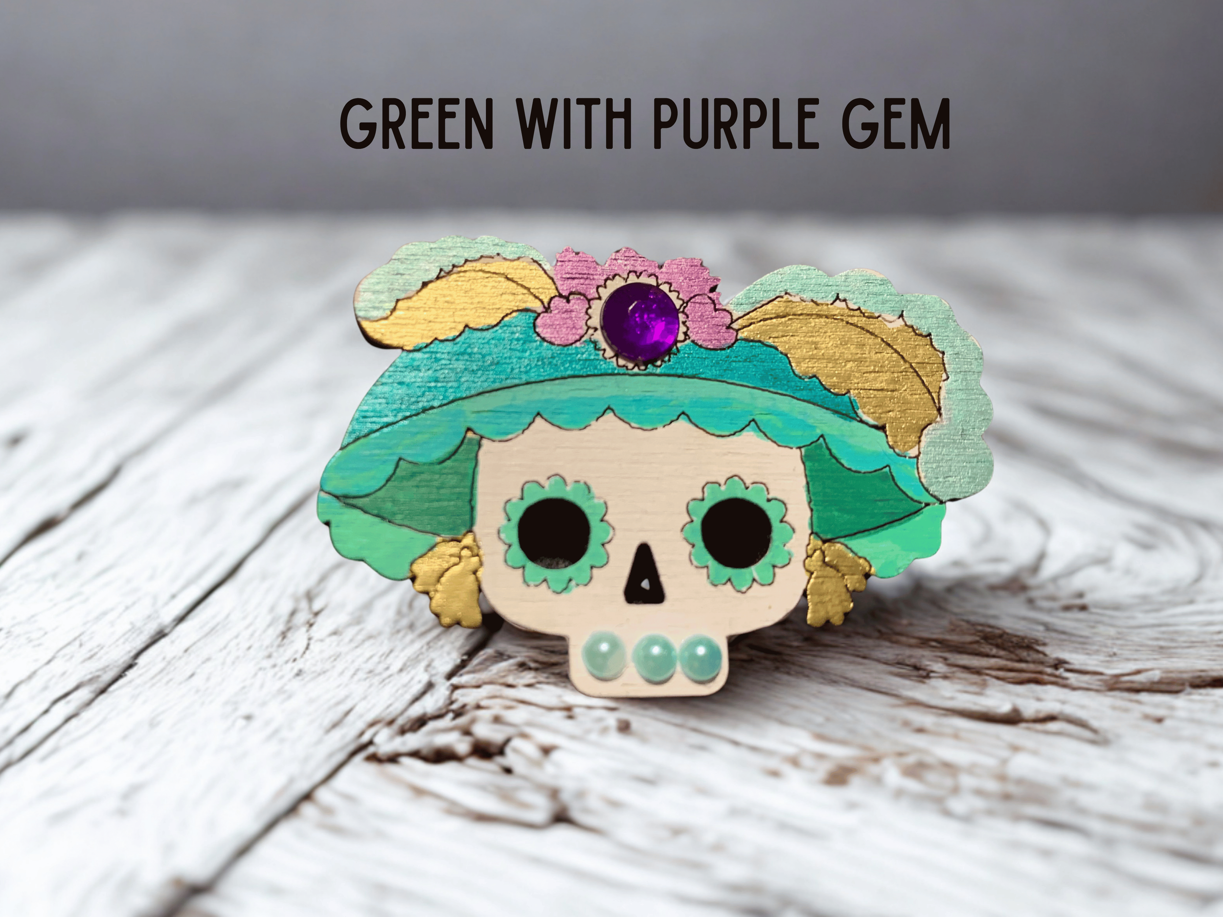 1_Catrina Green with Purple Gem.png