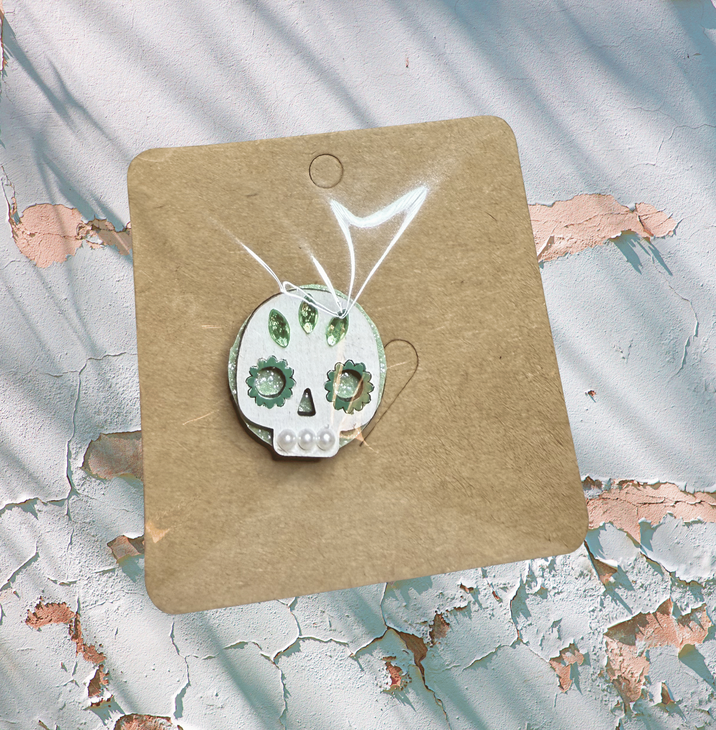 Small calavera pin.png