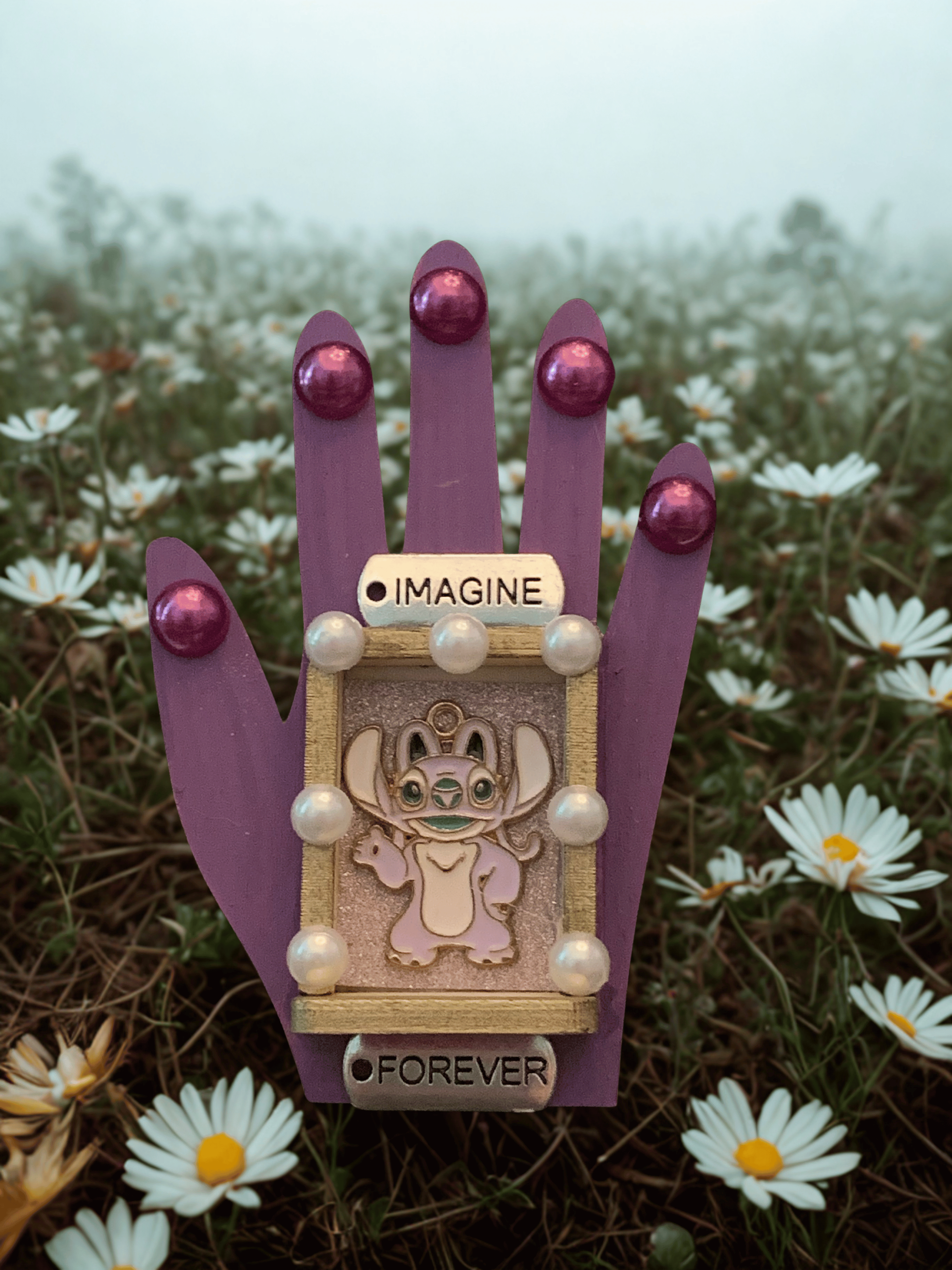 12_Imagine Forever Hand Nicho.png