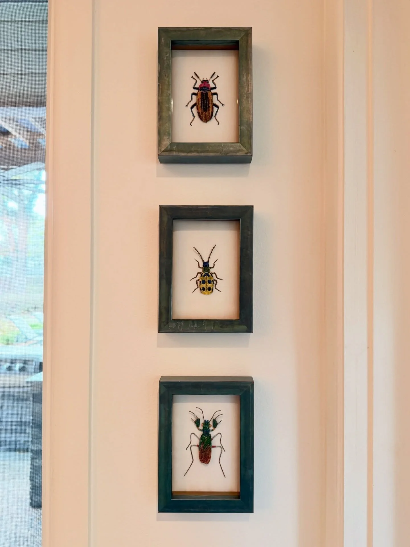 We love getting pics from our customers! 🪲 aren&rsquo;t these beaded bugs the best?! I think we need some for the gallery 👀 
.
.
. 
#waddellsgallery #customframing #artgallery