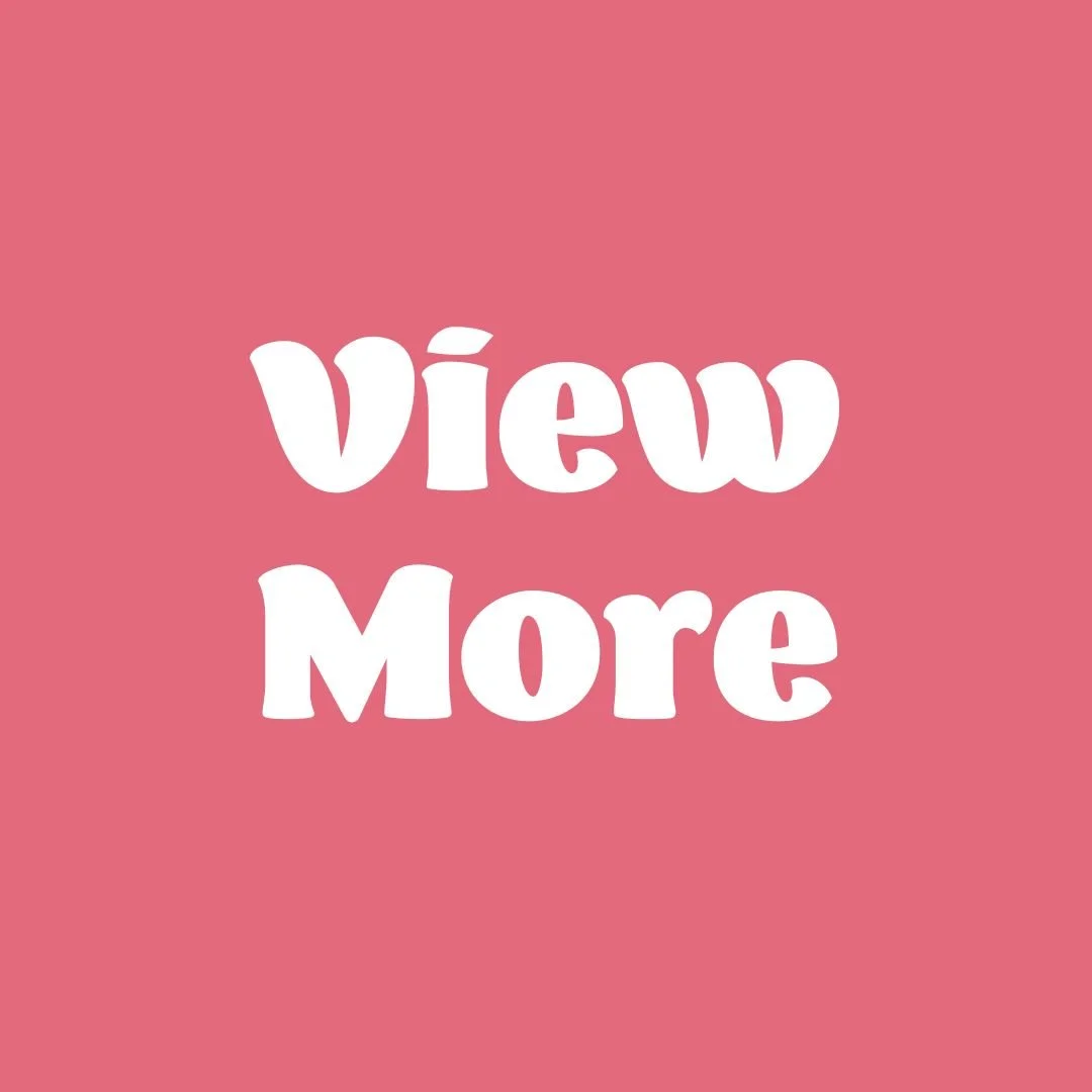 Pink background with white text that says "View More."