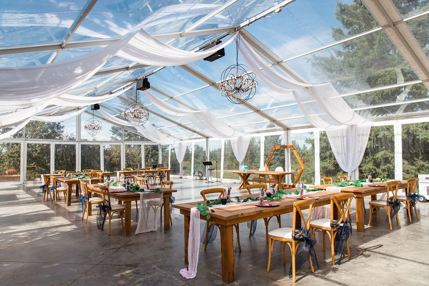 pine-and-pond-clear-tent-wedding-reception-setup.jpg