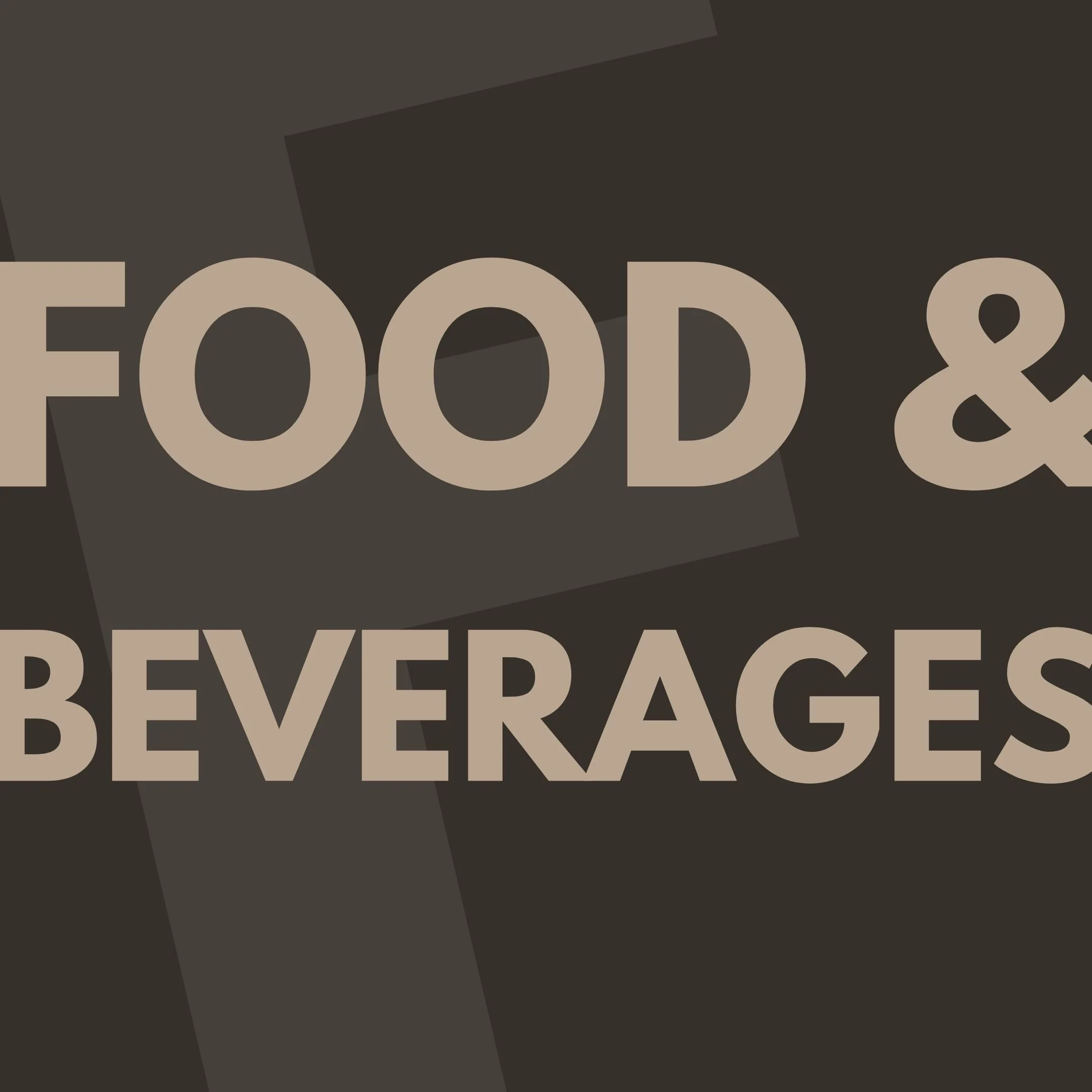 Close-up of a sign with the words "Food & Beverages" in large beige letters on a dark background