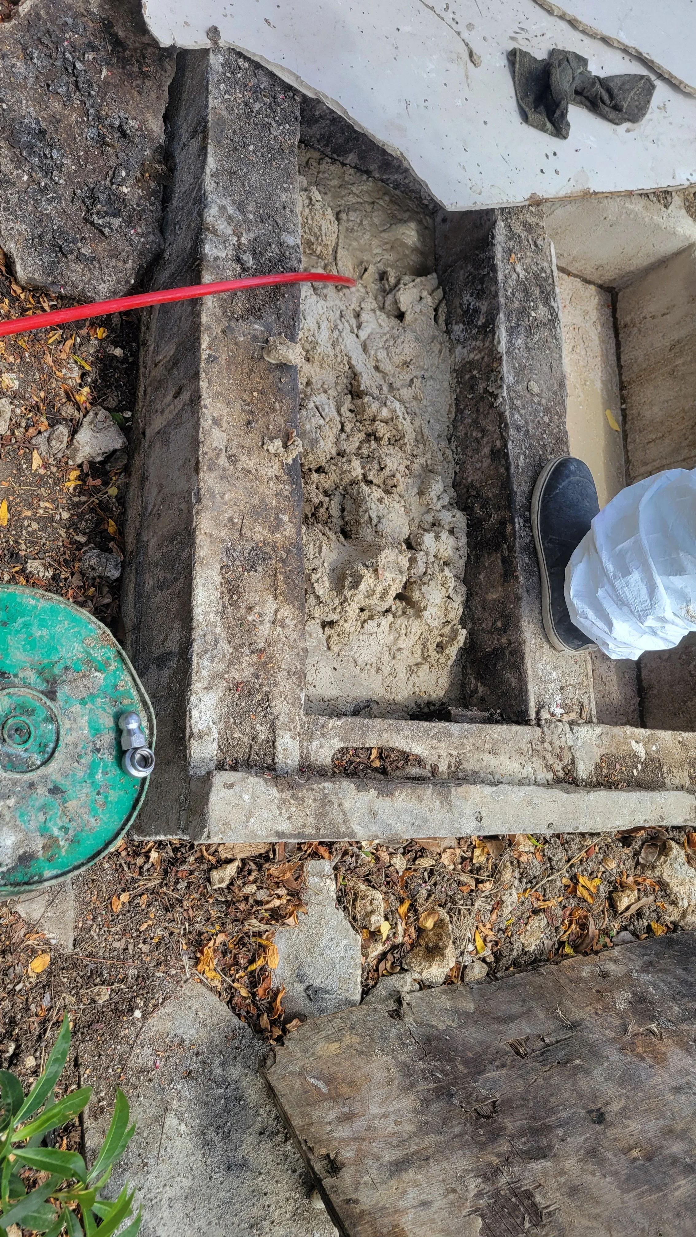 Before:
Heavy buildup restricting the drainage line.