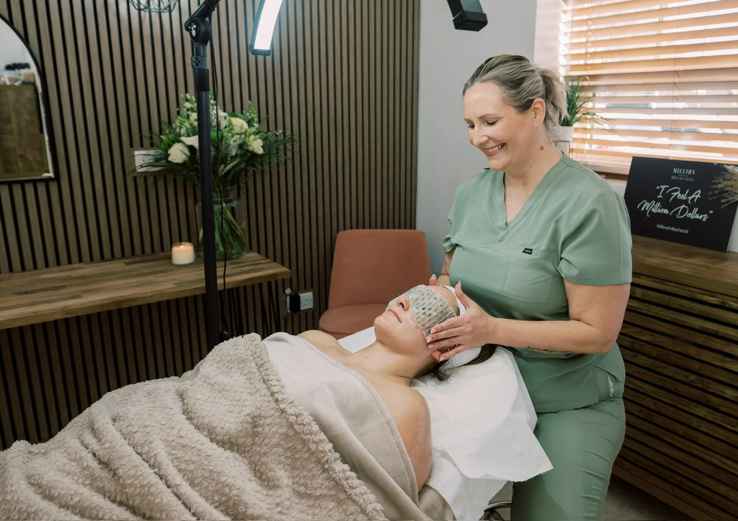 Lucy carrying out a facial treatment at Straday Studio in Fareham