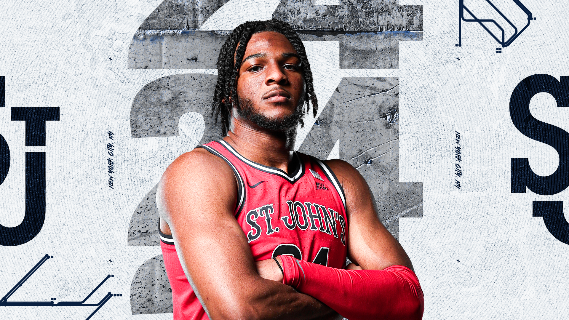 Portrait of a male basketball player in a red St. John's jersey with crossed arms, standing against a background featuring large numbers, graphical elements, and text referencing New York City.