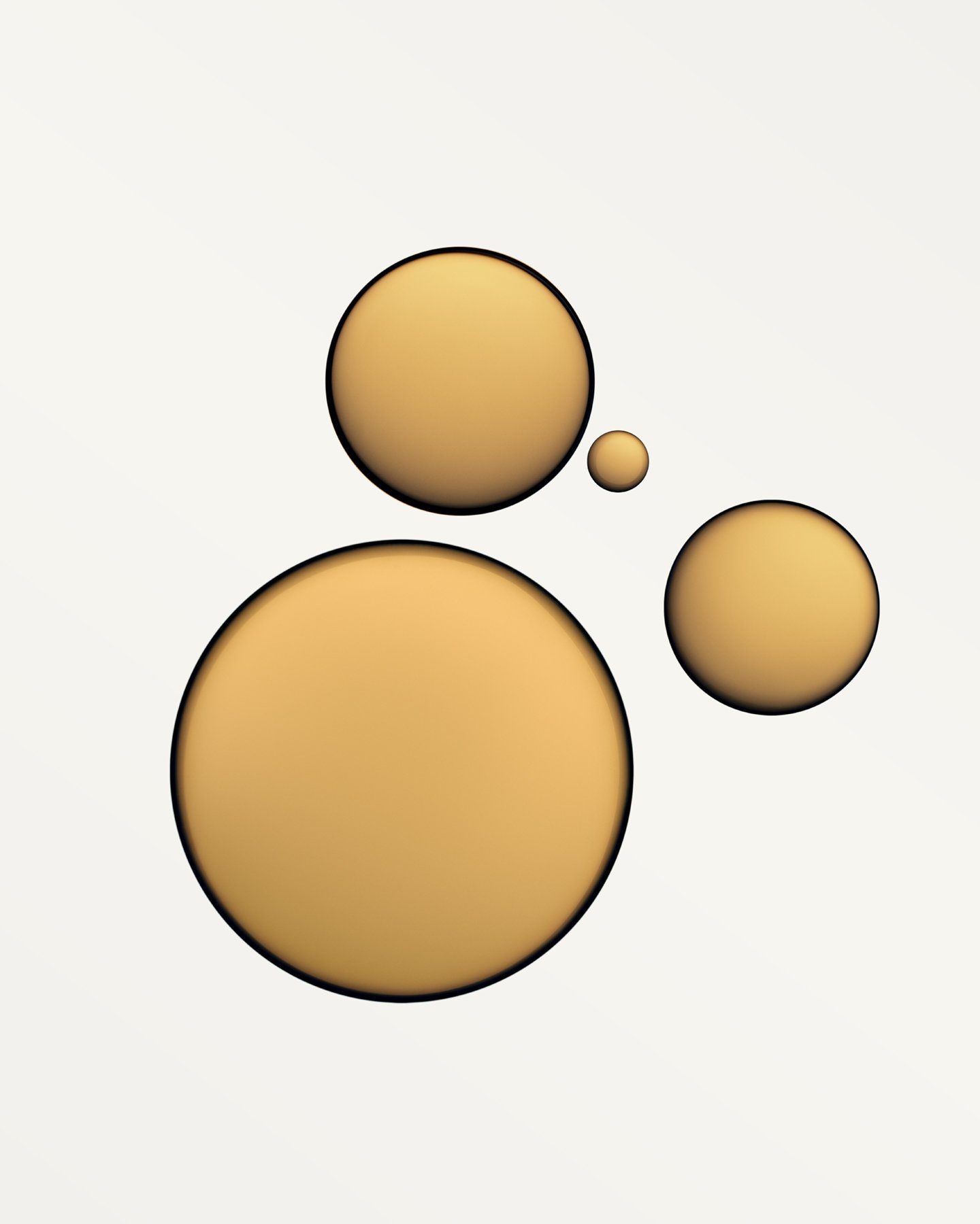 Abstract graphic of four overlapping makeup swatches with a gradient of orange and yellow hues on a white background.