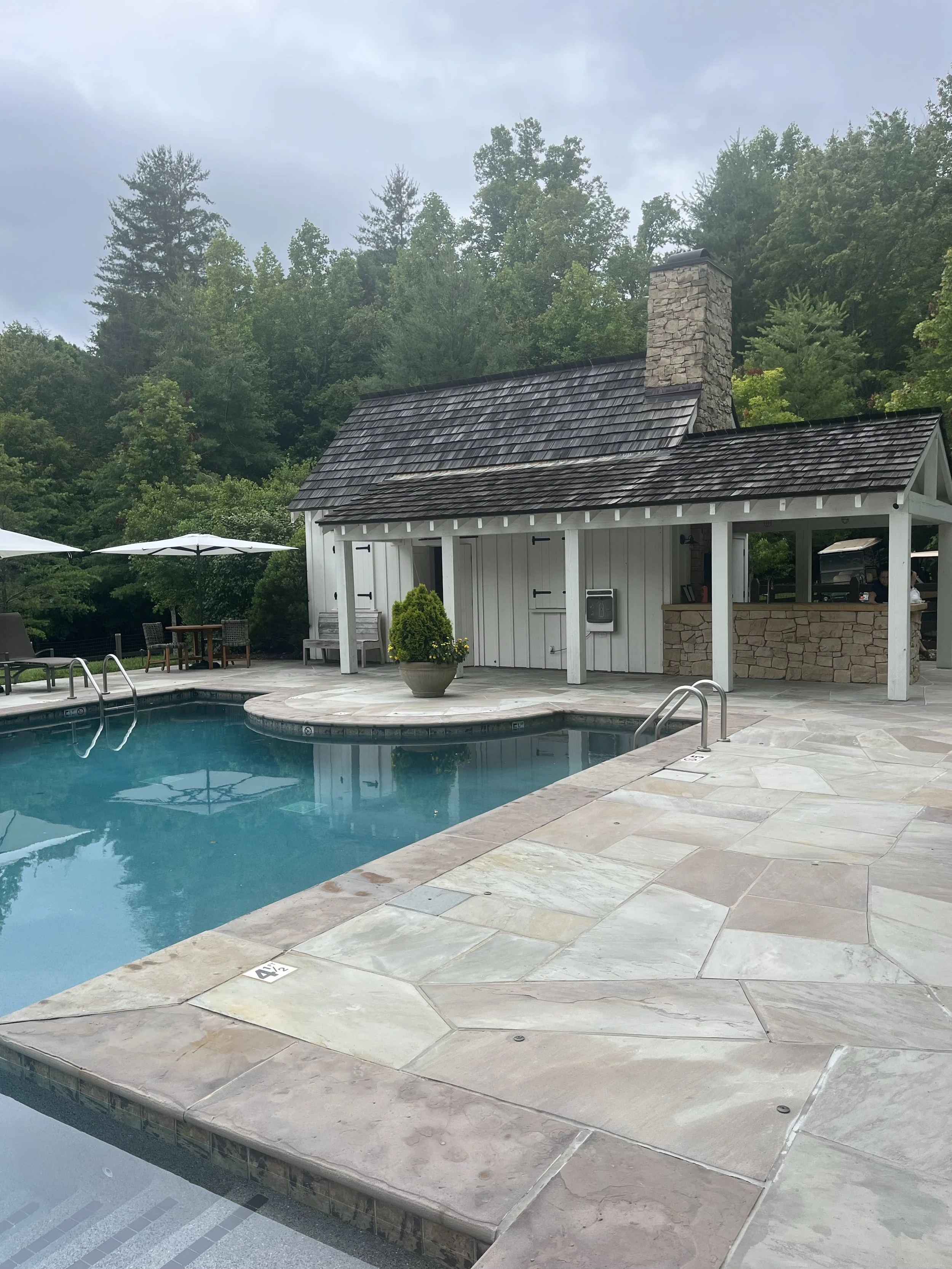 Farmside Pool at Blackberry Farm surrounded by meadow and lawn, Walland Tennessee