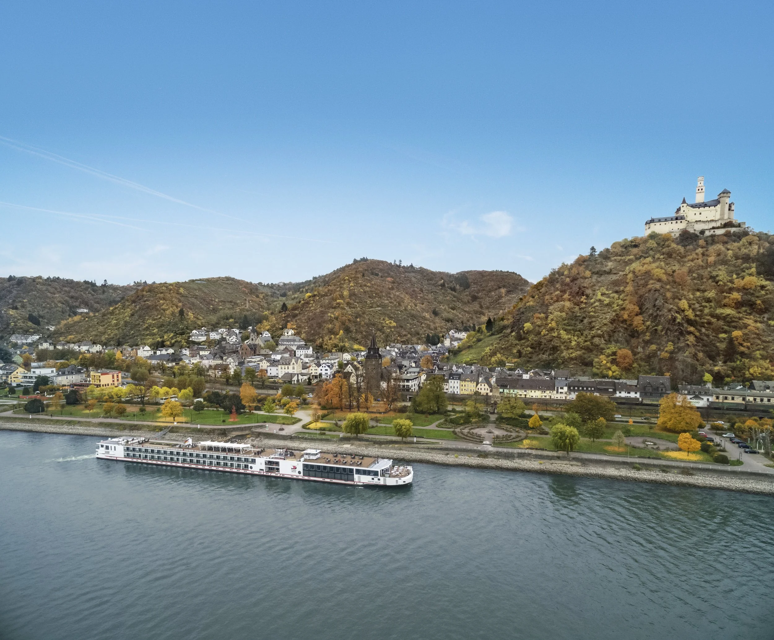 River cruise ship sailing past castles on Germany's Rhine River