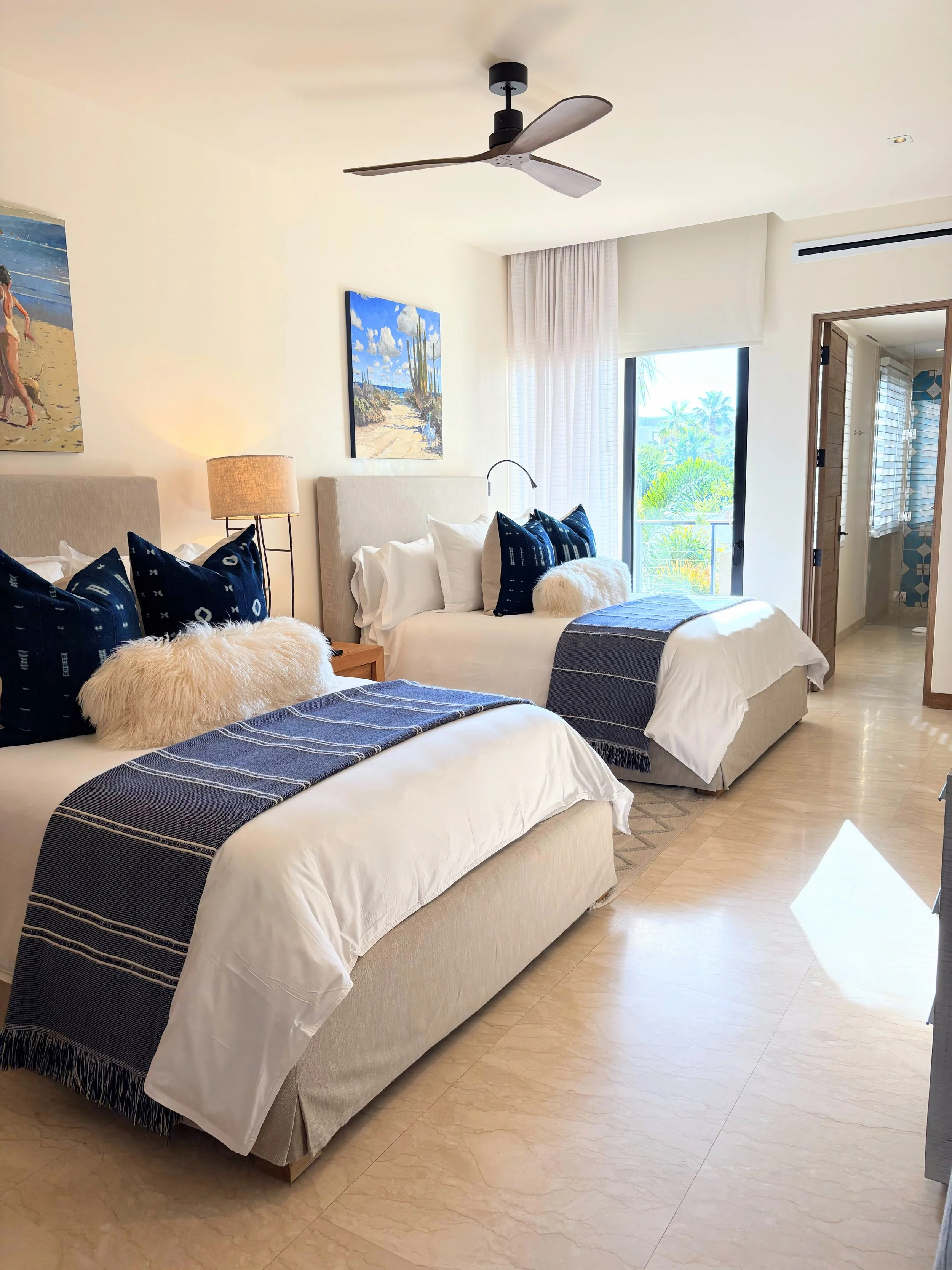 Chileno Bay Resort ocean view guest room with floor-to-ceiling windows and private terrace, Los Cabos Mexico 2026
