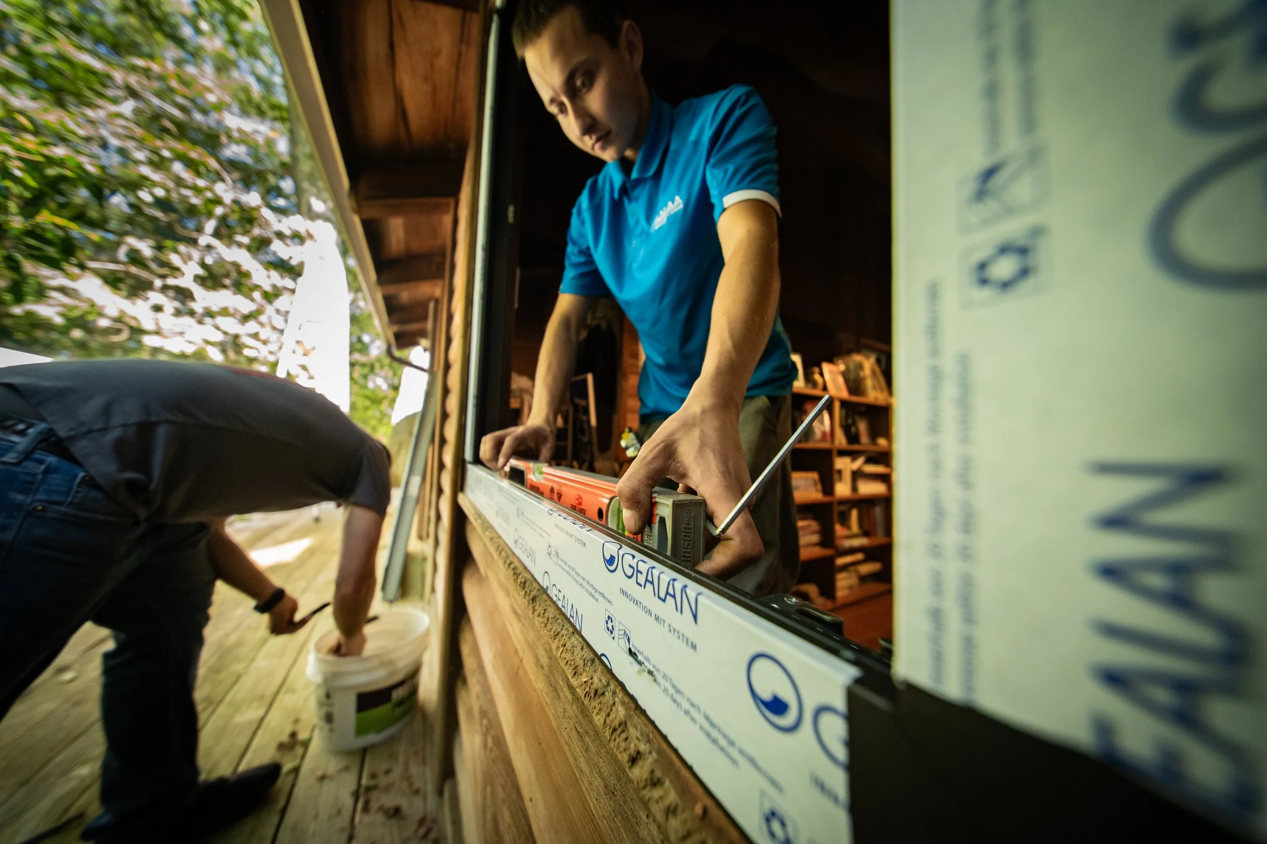 Galaa Windows installation team fitting high-performance European tilt-turn window into Connecticut home rough opening