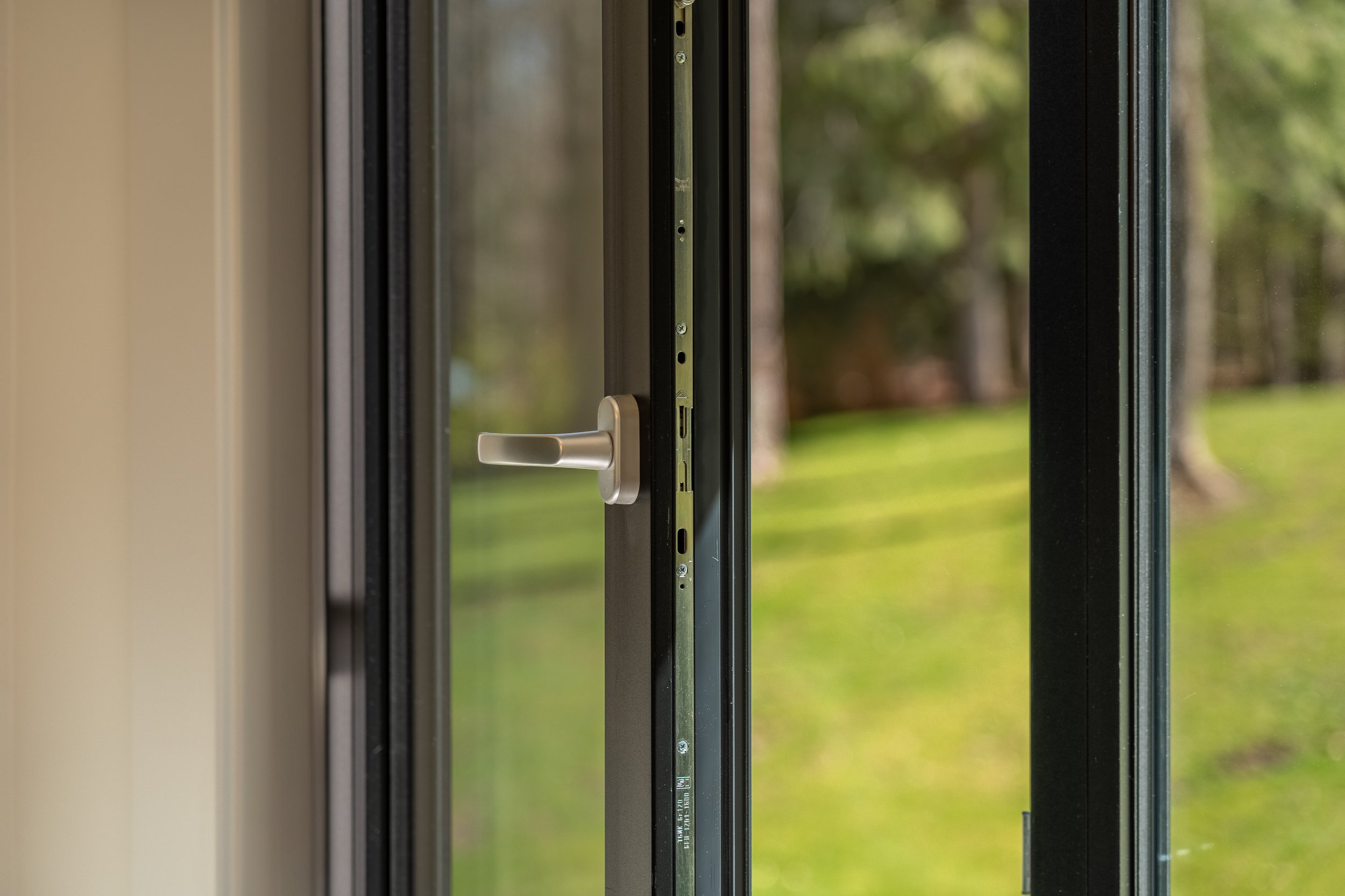 Close-up of GEALAN multi-chamber uPVC frame with triple-glazed Cardinal glass
