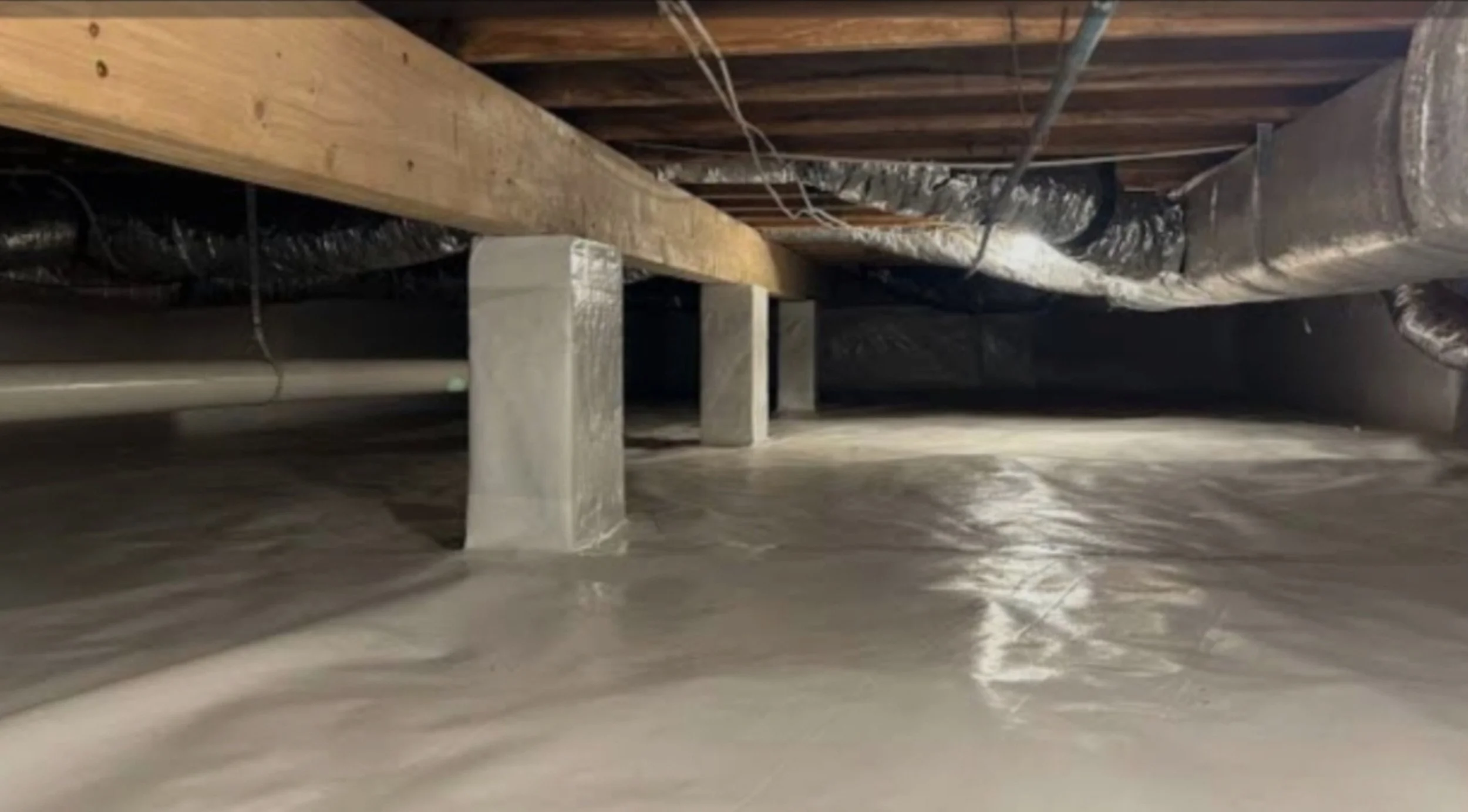 sealed crawlspace with vapor barrier installed for moisture control and air quality