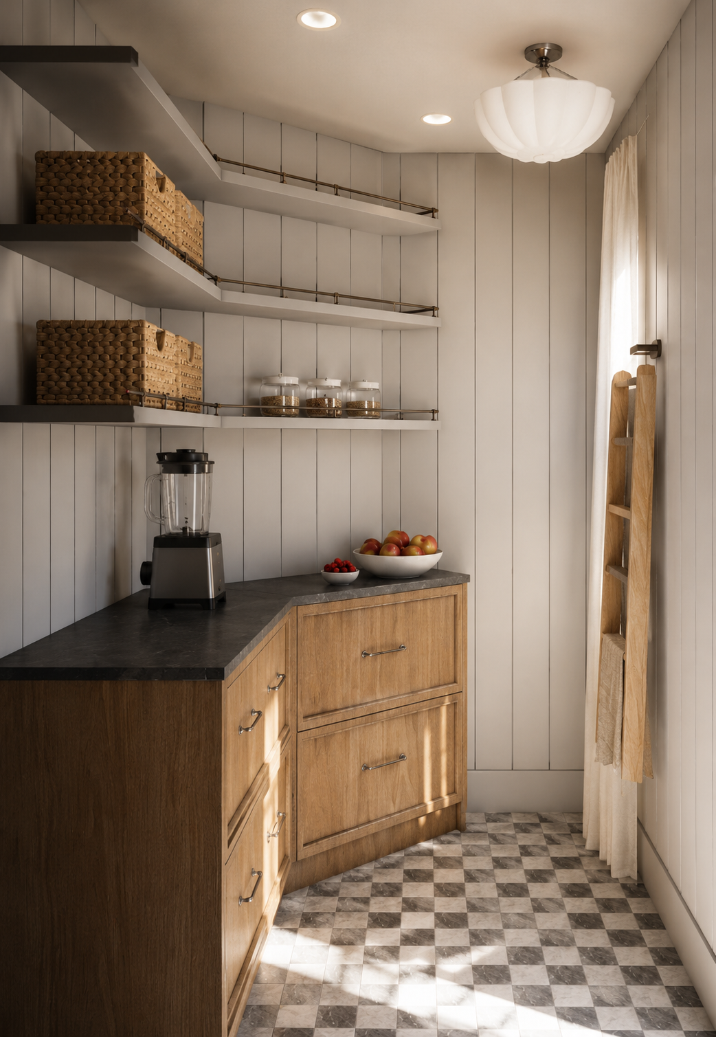 A cozy kitchen corner with white paneled walls, wooden cabinets, open shelves with wicker baskets, glass jars, a blender, a bowl of apples and berries, and a wood ladder next to a window with a curtain, lit by ceiling and natural light.