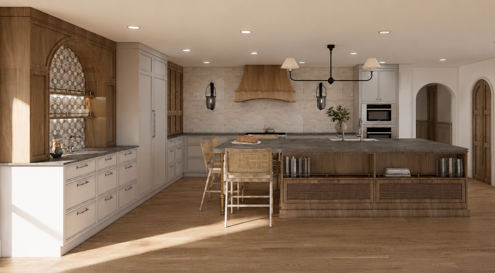 Modern kitchen with wooden cabinets, white walls, and a large central island with a gray countertop. There are bar stools with woven backs at the island, a vase with green leaves, and a plate of bread. The kitchen has built-in appliances, pendant lig