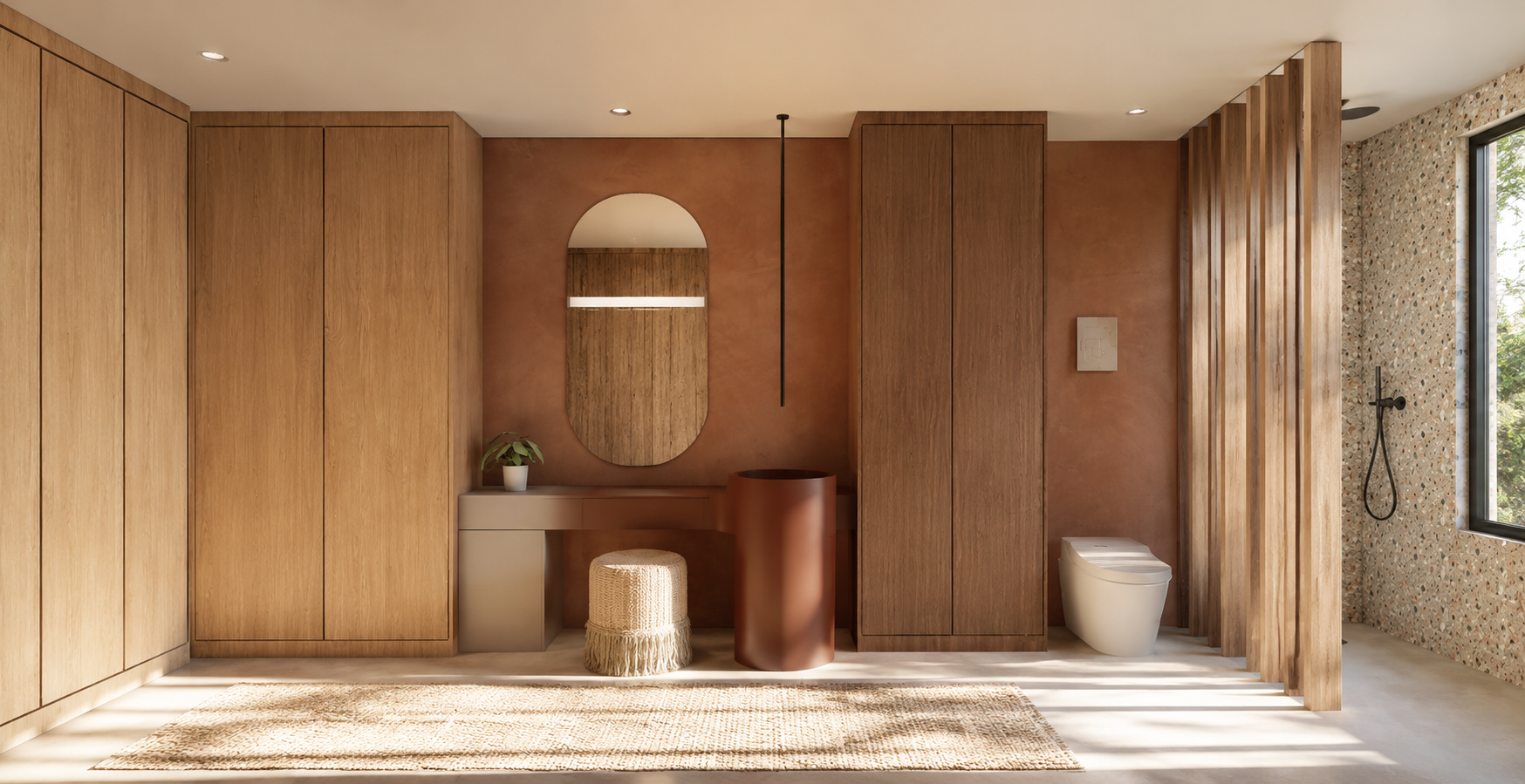 Modern bathroom with wooden cabinets, a toilet, a window with natural light, a terrazzo shower wall, and minimalist decor.