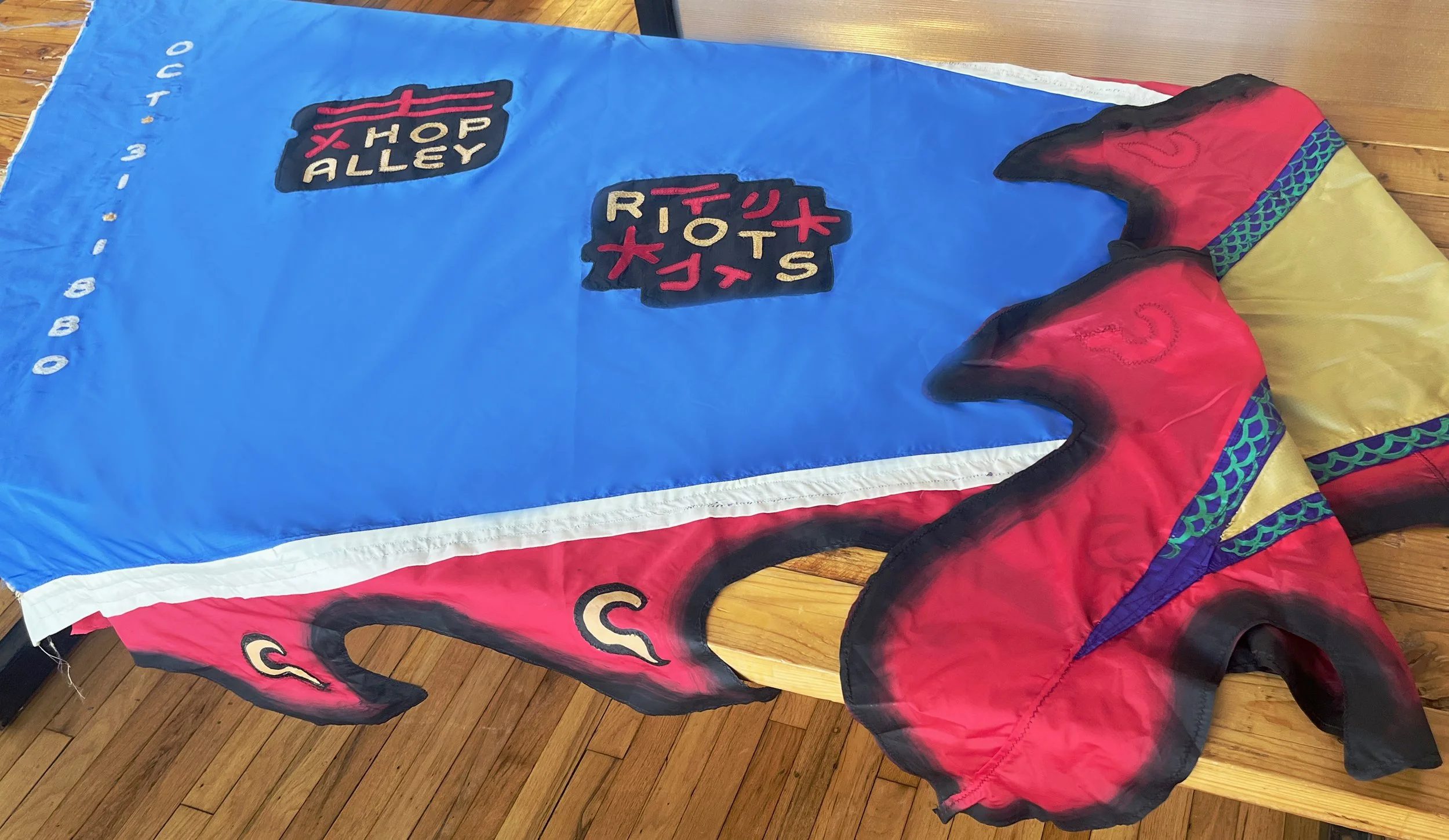 Close up of flag in English and Chinese